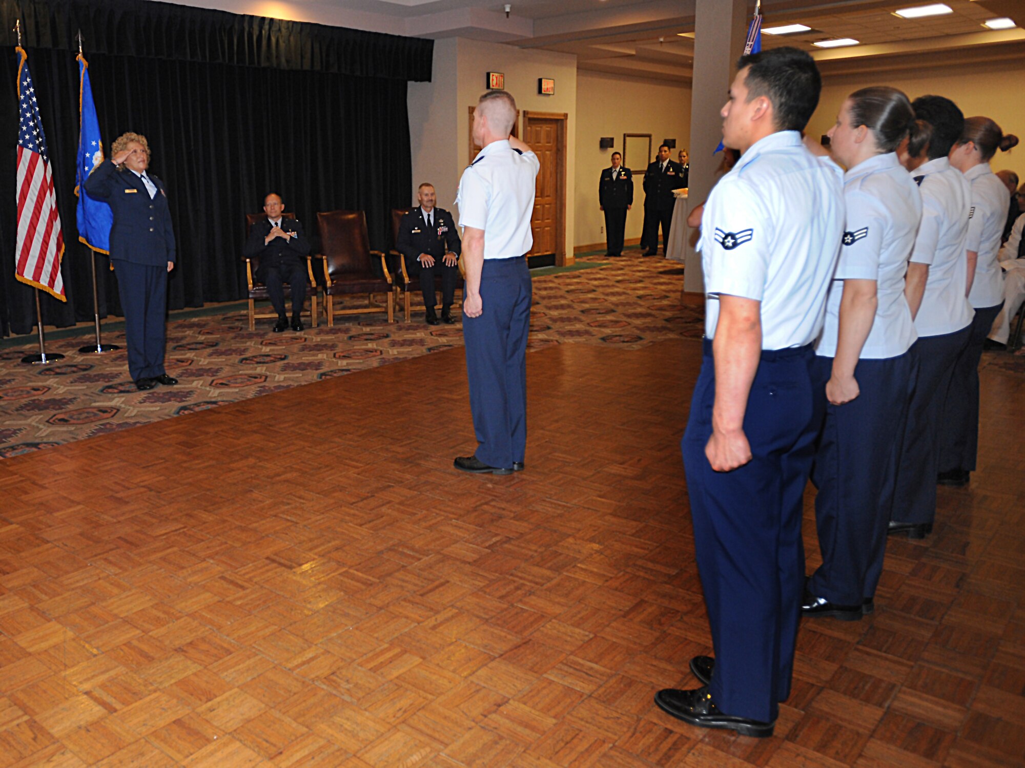 U.S. Air Force Lt. Col. Yolanda Rogers renders the first salute to her newly appointed 27th Special Operations Medical Operations Squadron from during the change-of-command ceremony Aug. 6, 2010. U.S. Air Force Lt. Col. James Reineke relinquished command of the 27th SOMOS. (U.S. Air Force photo by Airman 1st Class Maynelinne De La Cruz)(Released)
