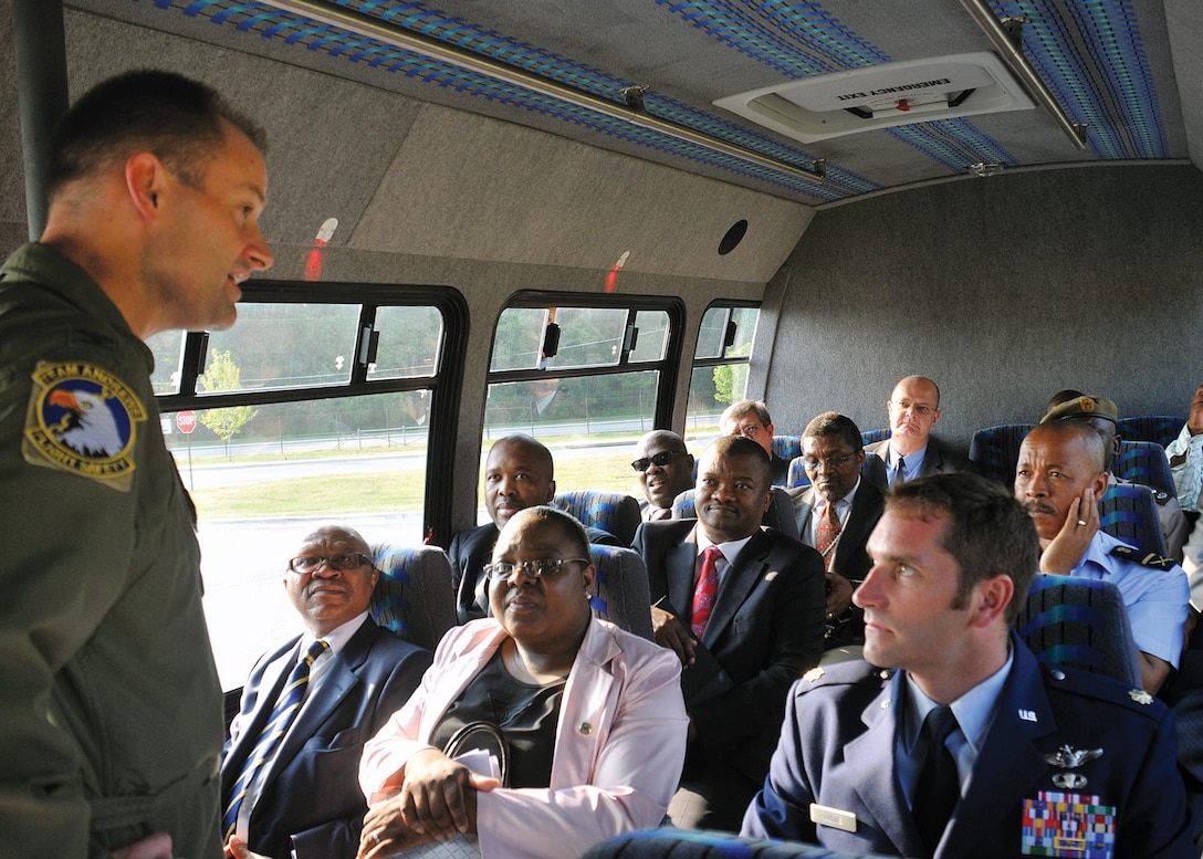JOINT BASE ANDREWS, Md. -- Colonel Ken Rizer, 316th Wing/Joint Base Andrews commander, gives an orientation brief to a group of South African delegates, during a windshield tour of Andrews July 29. The group was in town to tour the Washington D.C. area to gain knowledge on how the Department of Defense supports its military personnel for their own military retention purposes. (U.S. Air Force photo by Senior Airman Katie Spencer)