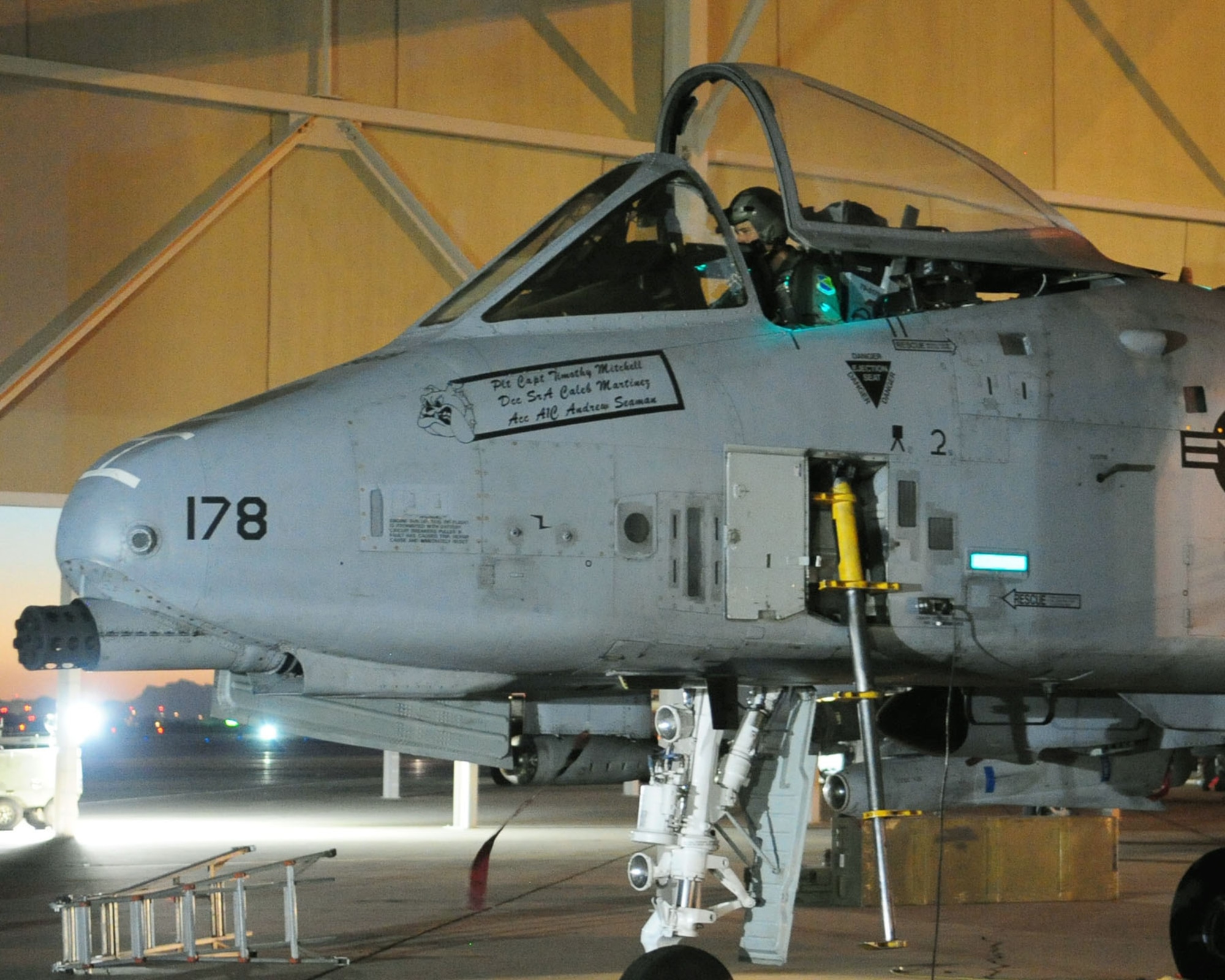 The canopy of his A-10C Thunderbolt II lowers as 1st Lt. Dan Griffin, a pilot from the 358th Fighter Squadron at Davis-Monthan Air Force Base, Ariz., prepares to taxi out for his second of eight night flying missions June 23, 2010. Lieutenant Griffin is a student in the A-10C Pilot Initial Qualification course and as part of his training requirements he must learn to execute night flying missions using night vision goggles. He will accomplish this training through six hours of academic classes, five hours in the A-10 flight simulator and training flights. (U.S. Air Force photo/Airman 1st Class Jerilyn Quintanilla)