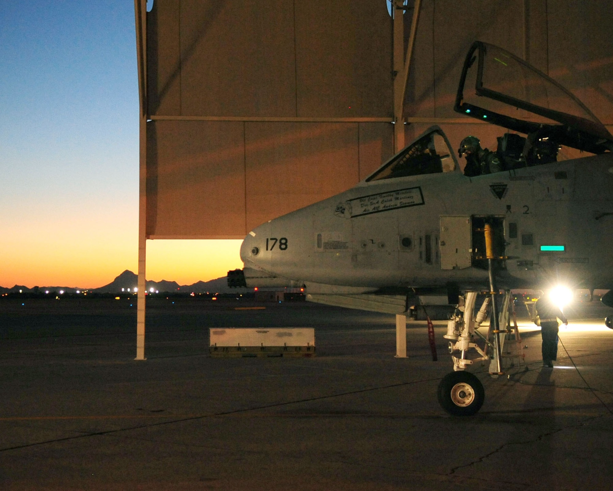 1st Lt. Dan Griffin, a pilot from the 358th Fighter Squadron at Davis-Monthan Air Force Base, Ariz., performs his final operations checks on his A-10C Thunderbolt II prior to departing for a night flying mission June 23, 2010. Lieutenant Griffin is a student in the A-10C Pilot Initial Qualification course and upon completion of this course he will be a fully qualified A-10C pilot. (U.S. Air Force photo/Airman 1st Class Jerilyn Quintanilla)