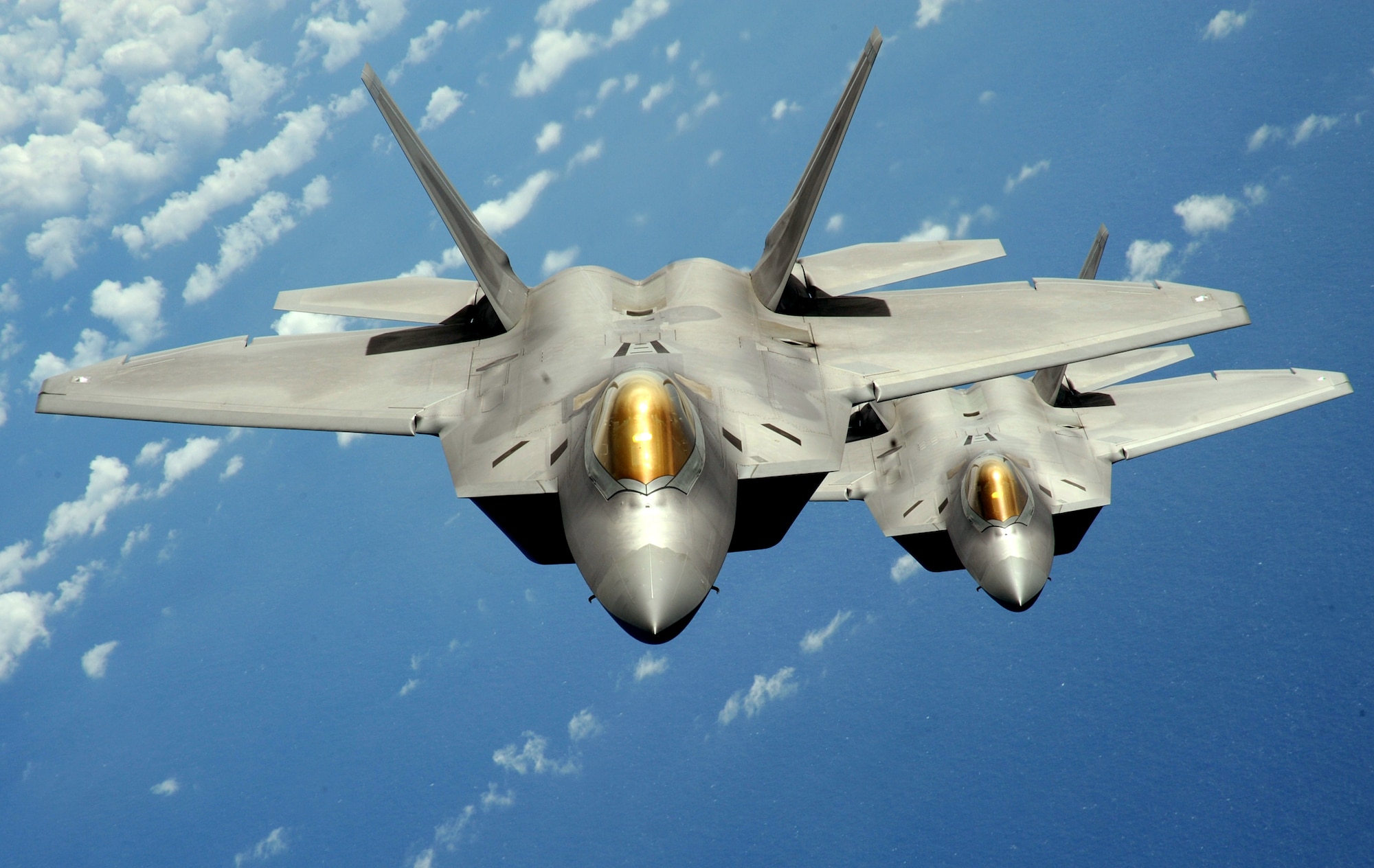Members of the 27th Expeditionary Aircraft Maintenance Unit completed the first accelerated packaged maintenance plan on an F-22 Raptor in a deployed environment Aug. 4, 2010, at Andersen Air Force Base, Guam. The unit had 10 days to complete a process that normally takes up to a month. (U.S. Air Force photo/ Master Sgt. Kevin J. Gruenwald)