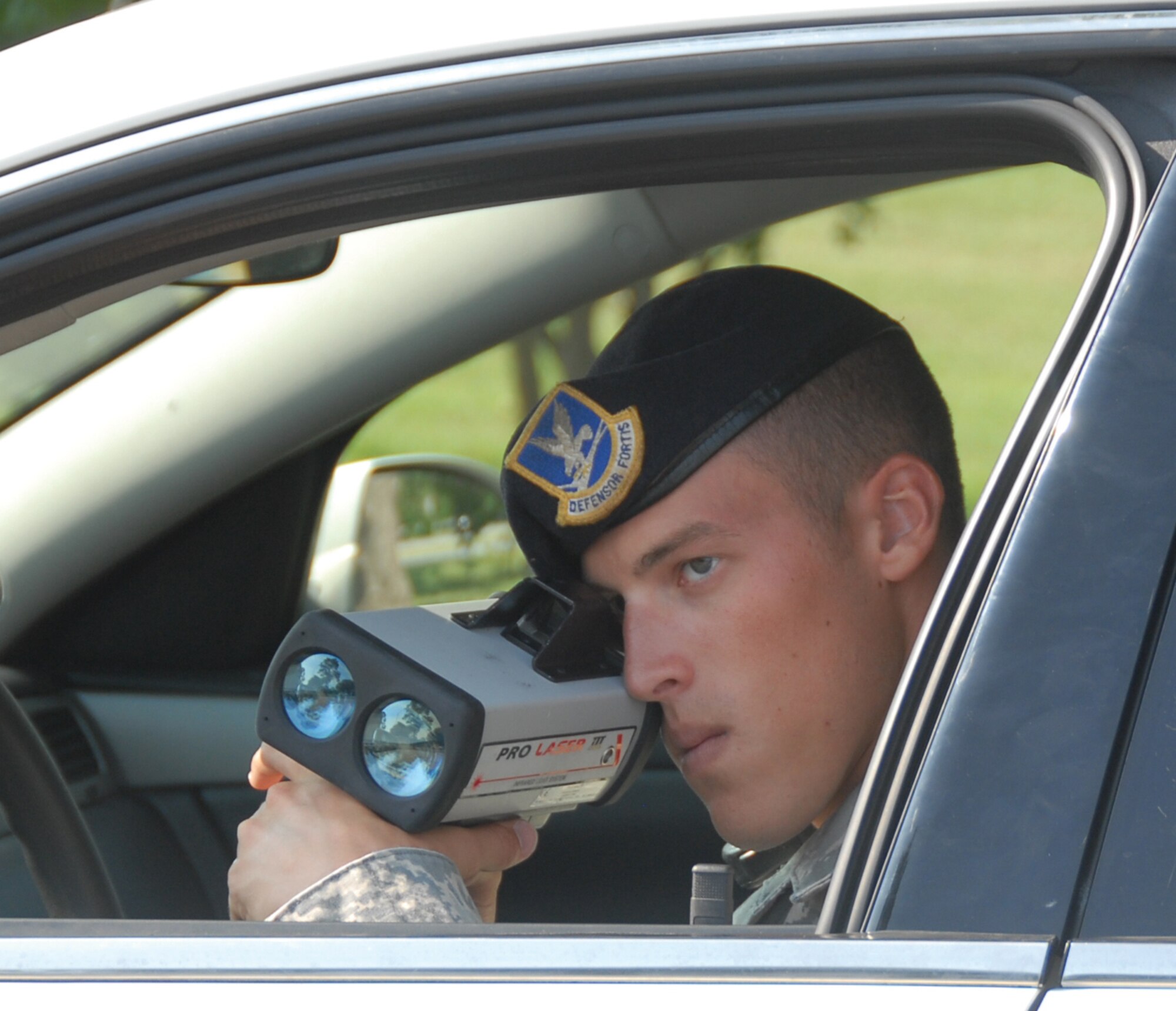 Senior Airman Jonathon Leon, 78th Security Forces, clocks cars on base. Speeders could potentially lose driving privileges on base, even first-time offenders. U.S. Air Force photo by Tech Sgt. Vannie Miller