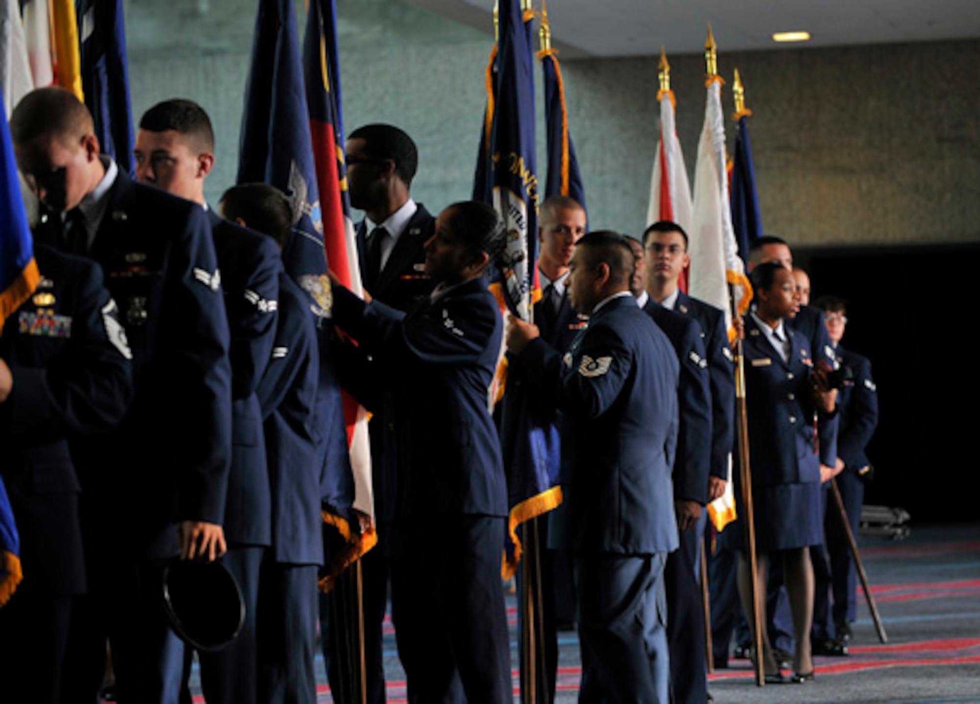 U.S. Air Force personnel from Maguire Air Force Base, NJ, prepares to post the colors of each state flag at the League of United Latin American Citizens Veterans' Recognition Breakfast, Albuquerque, N.M., July. 14, 2010.  The Veterans' breakfast featured several keynote speakers and awards presented by LULAC National President Rosa Rosales. (U.S. Air Force photo by Staff Sgt. Dayton Mitchell/RELEASED)