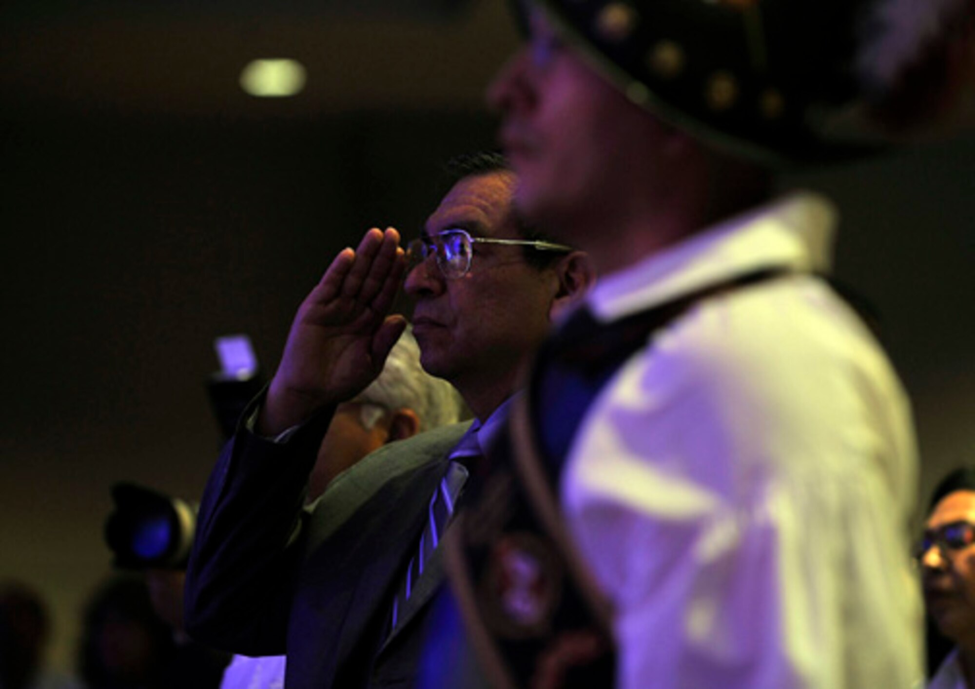 U.S. Army General Ricardo Sanchez, retired, salutes during the playing of the National Anthem at the League of United Latin American Citizens Veterans' Recognition Breakfast, Albuquerque, N.M., July 14, 2010.  The Veterans' breakfast featured several keynote speakers and awards presented by LULAC National President Rosa Rosales. (U.S. Air Force photo by Staff Sgt. Dayton Mitchell/RELEASED)
