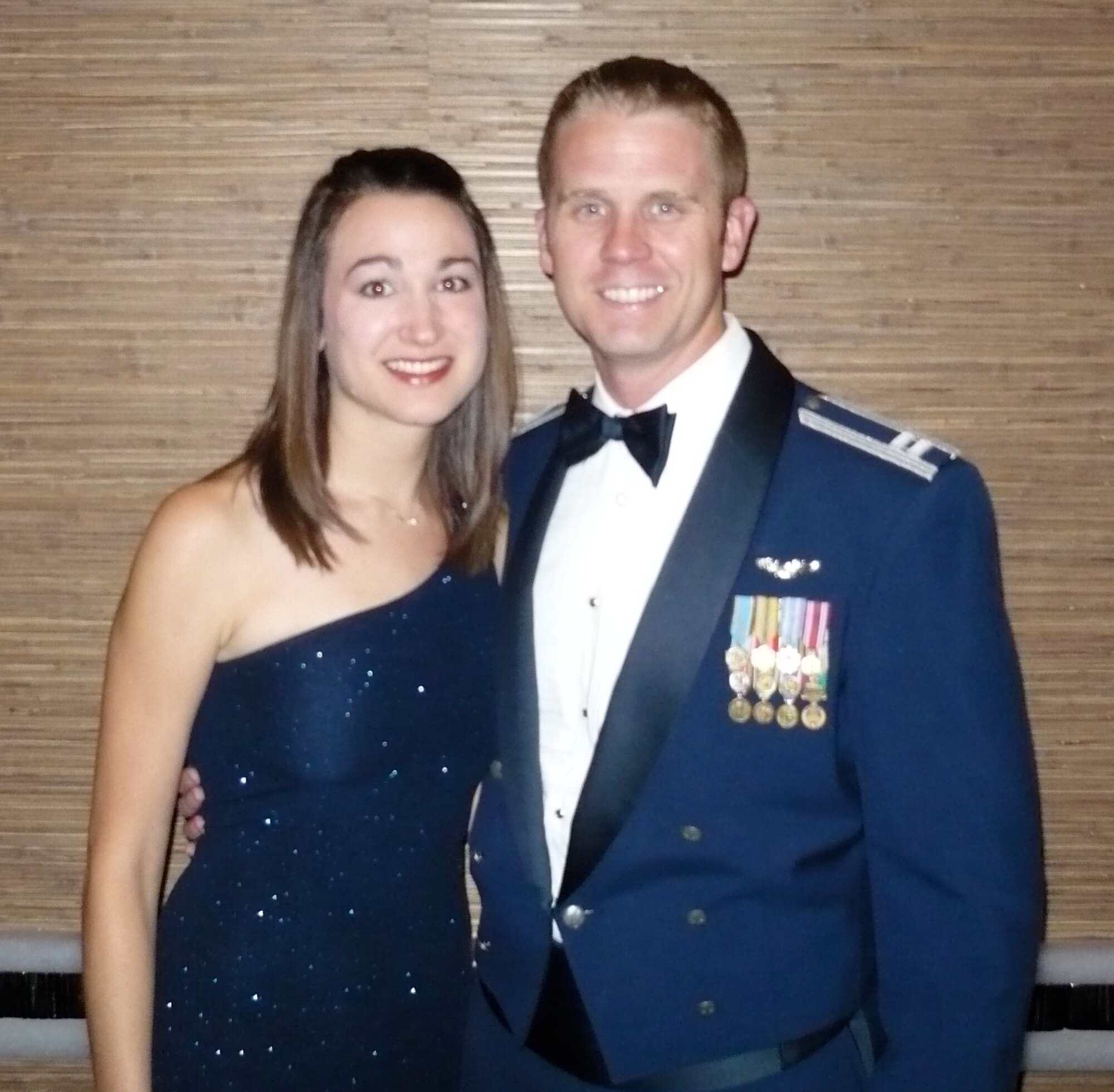 MINOT AIR FORCE BASE, N.D. – Capt. Eric Schmidt and his wife, Laura, attend a dining out for the stand-up of the 69th Bomb Squadron in 2009. Captain Schmidt has been diagnosed with cancer and has received much support from the Air Force bomber community. (Courtesy photo)