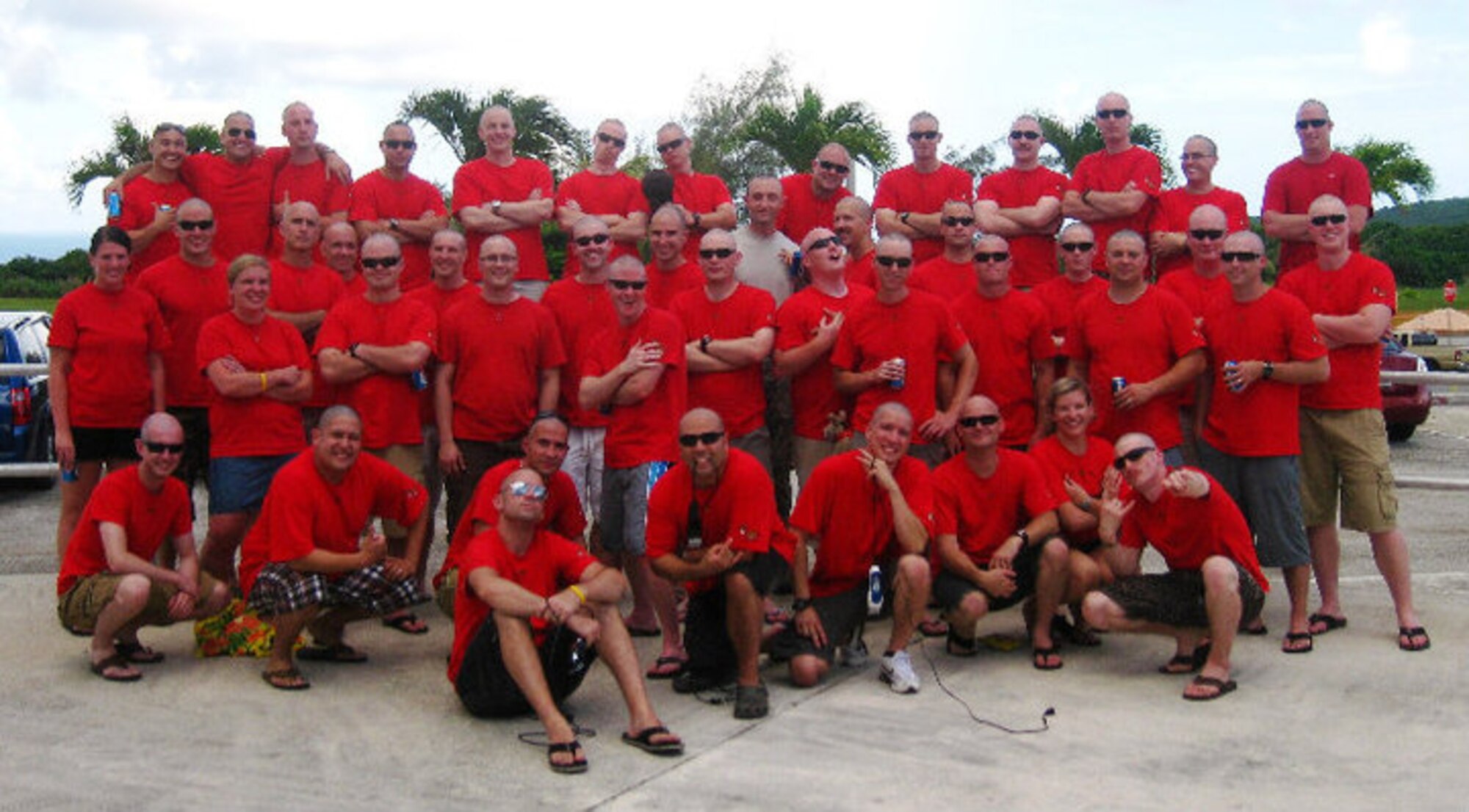 ANDERSEN AIR FORCE BASE, GUAM -- The 23rd Expeditionary Bomb Squadron from Minot Air Force Base, N.D., currently deployed to Guam, show their support by shaving their heads for Capt. Eric Schmidt, 96th Bomb Squadron, Barksdale AFB, La., who was recently diagnosed with cancer. (Courtesy photo)