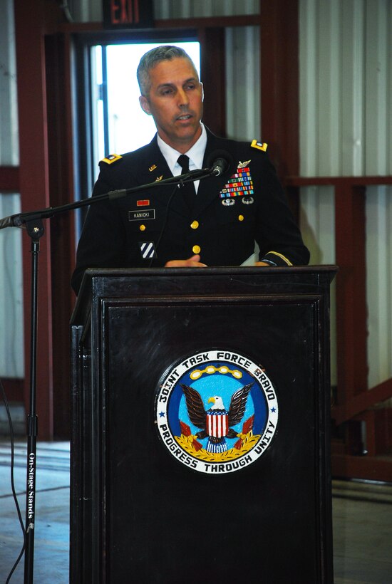 SOTO CANO AIR BASE, Honduras --  Asking his Soldiers to remain strong, Lt. Col. James Kanicki, the 1-228th Aviation Regiment commander, speaks at the memorial ceremony for two fallen 1-228th Soldiers here Aug. 5. Sgt. Luis Brito and Sgt. Leodegario Lizárraga died in a car accident July 31. (U.S. Air Force photo/Martin Chahin)