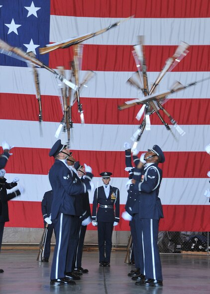The Air Force Honor Guard Drill team performs their “mass over” movement while visiting Kirtland Air Force Base at the start of their southwest tour Monday.  U. S. Air Force photo by Todd Berenger.