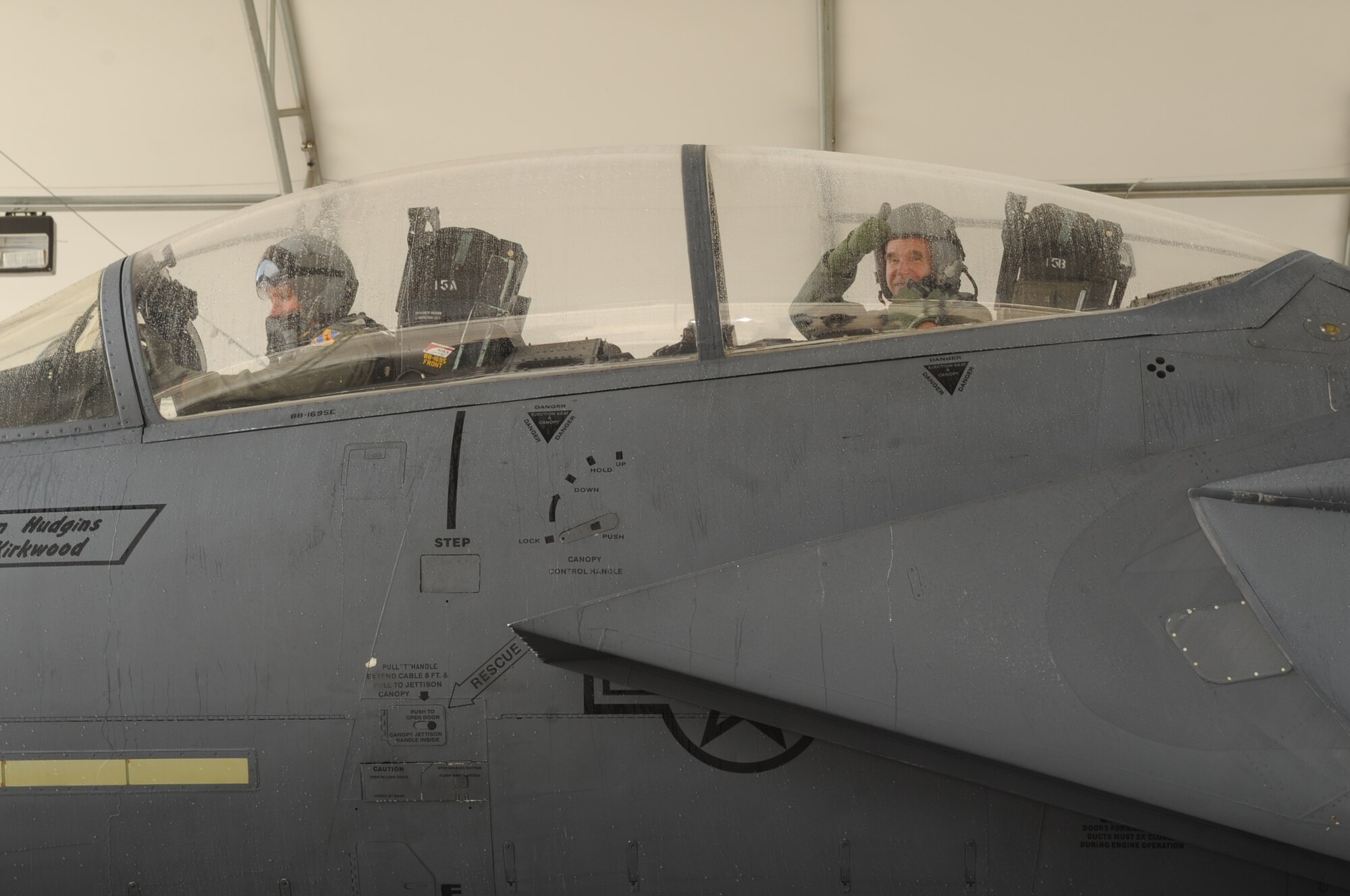 SEYMOUR JOHNSON AIR FORCE BASE, N.C. -- Maj. Gen. William Holland gives a thumbs up after a flight in an F-15E Strike Eagle with Col. Patrick Doherty here Aug. 3, 2010. Upon landing the general?s jet passed through an aircraft hose down and a greeting from the men and women of the 4th Fighter Wing. General William L. Holland is the commander, 9th Air Force, Air Combat Command, Shaw Air Force Base, S.C. and Colonel Doherty is the commander, 4th Fighter Wing.  (U.S. Air Force photo /Staff Sgt. Courtney Richardson)