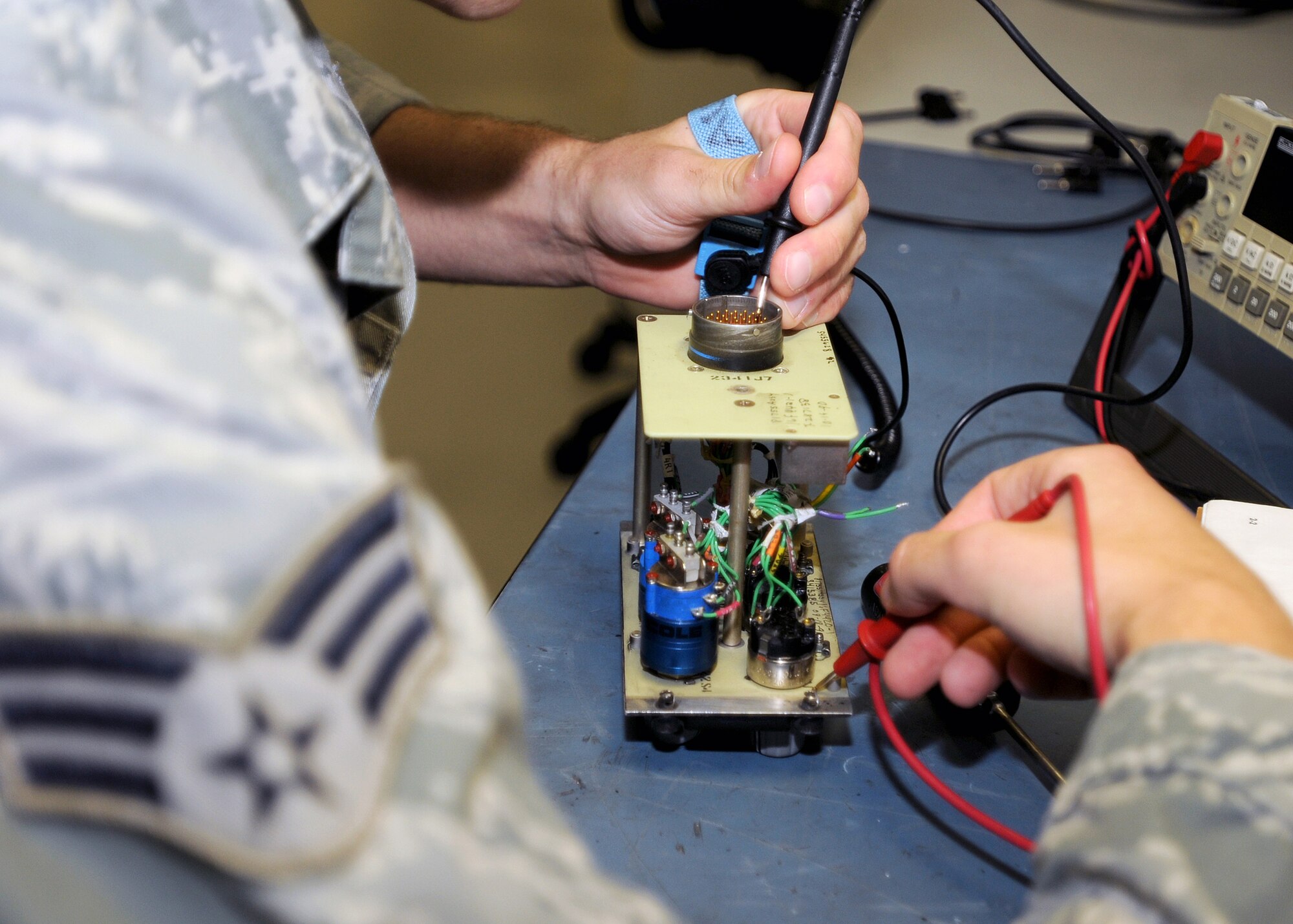 Senior Airman Daniel Austin, 31st Maintenance Squadron Avionics Intermediate Section journeyman, performs an operational check on an Audio One Panel Aug. 6.  Avionics is the science and technology of the development and use of electrical and electronic devices in aviation.  (U.S. Air Force photo/Senior Airman Tabitha M. Lee)