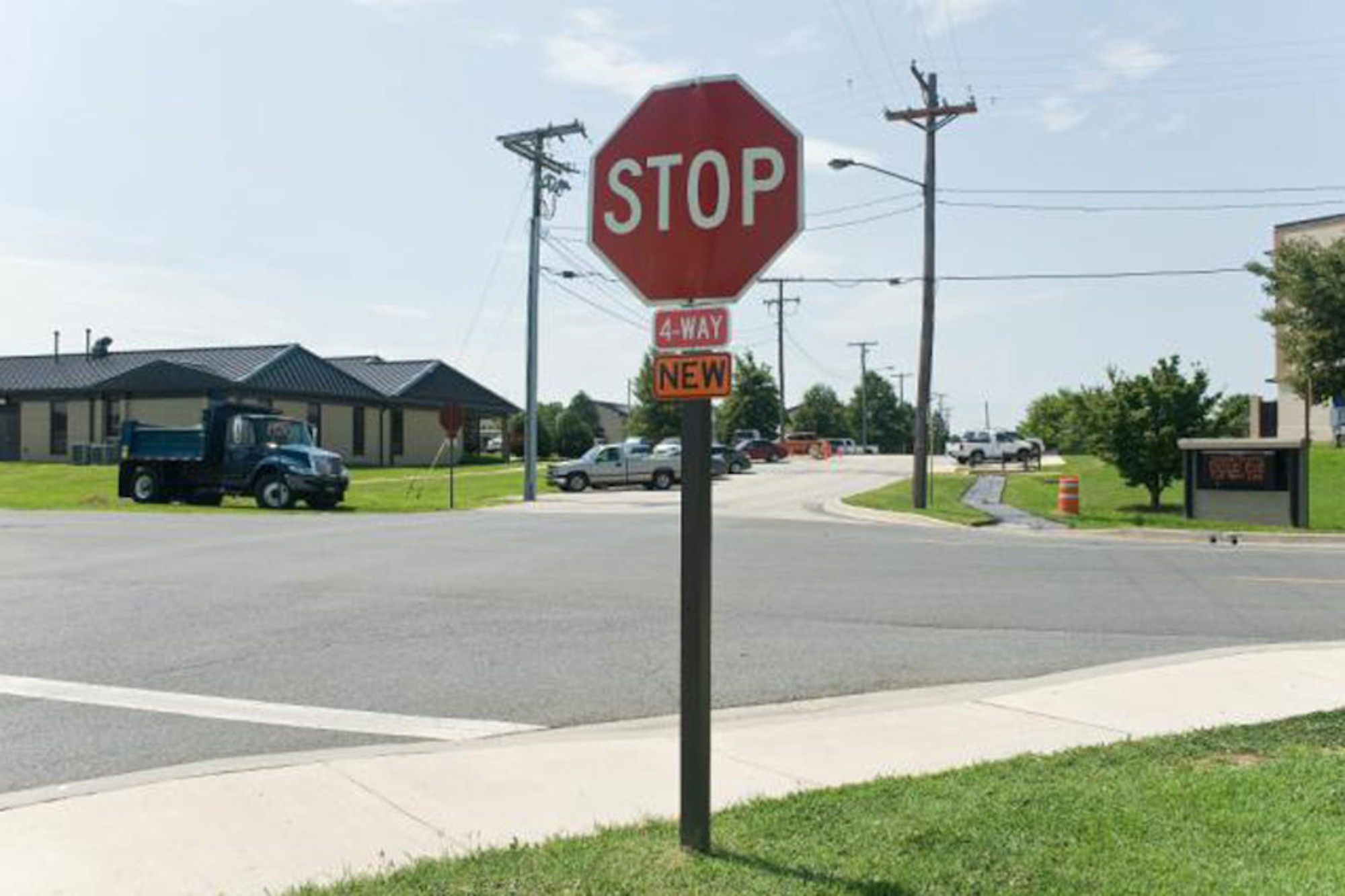 A new stop sign sits at the corner of Eagle Way and Tuskegee on Dover Air Force, Del., Aug. 5, 2010. The new four-way stop should help control congestion near the medical center. (U.S. Air Force photo by Roland Balik/Released)