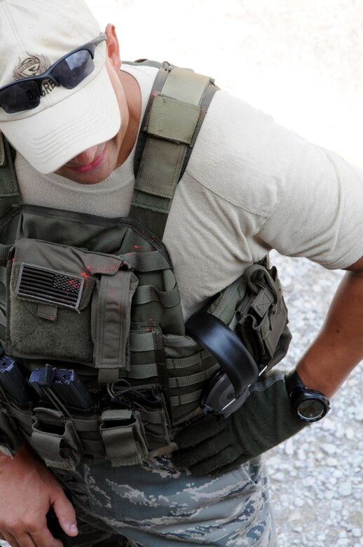 A Deployed Aircraft Ground Response Element member with 919th Security Forces Squadron waits to begin training on a hot Aug. 7 morning.  SFS Reservists from Duke Field participated in refresher training on IEDs, weapons, room clearing and neutralizing threats during the August UTA.  (U.S. Air Force photo/Tech. Sgt. Samuel King Jr.)