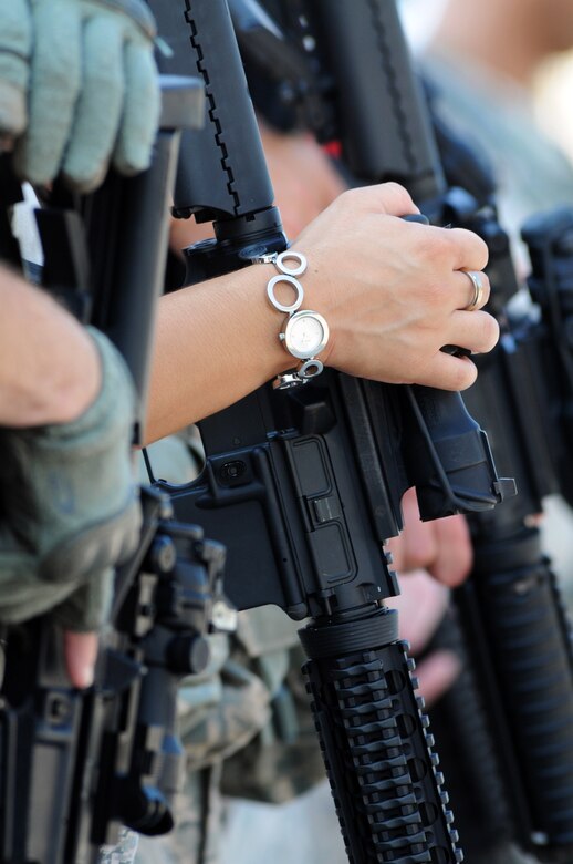 Tech. Sgt. Candice Wahowski, 919th Security Forces Squadron, holds her weapon in line with other Security Forces Airmen prior to room-clearing training at Eglin Air Force Base Fla. SFS teams practiced entry and clearing tactics and procedures with varying targets, objectives and ammunition Aug. 7. Blanks and simulated munitions were used to create a more realistic scenario for the Reservists from Duke Field.  (U.S. Air Force photo/Tech. Sgt. Samuel King Jr.)
