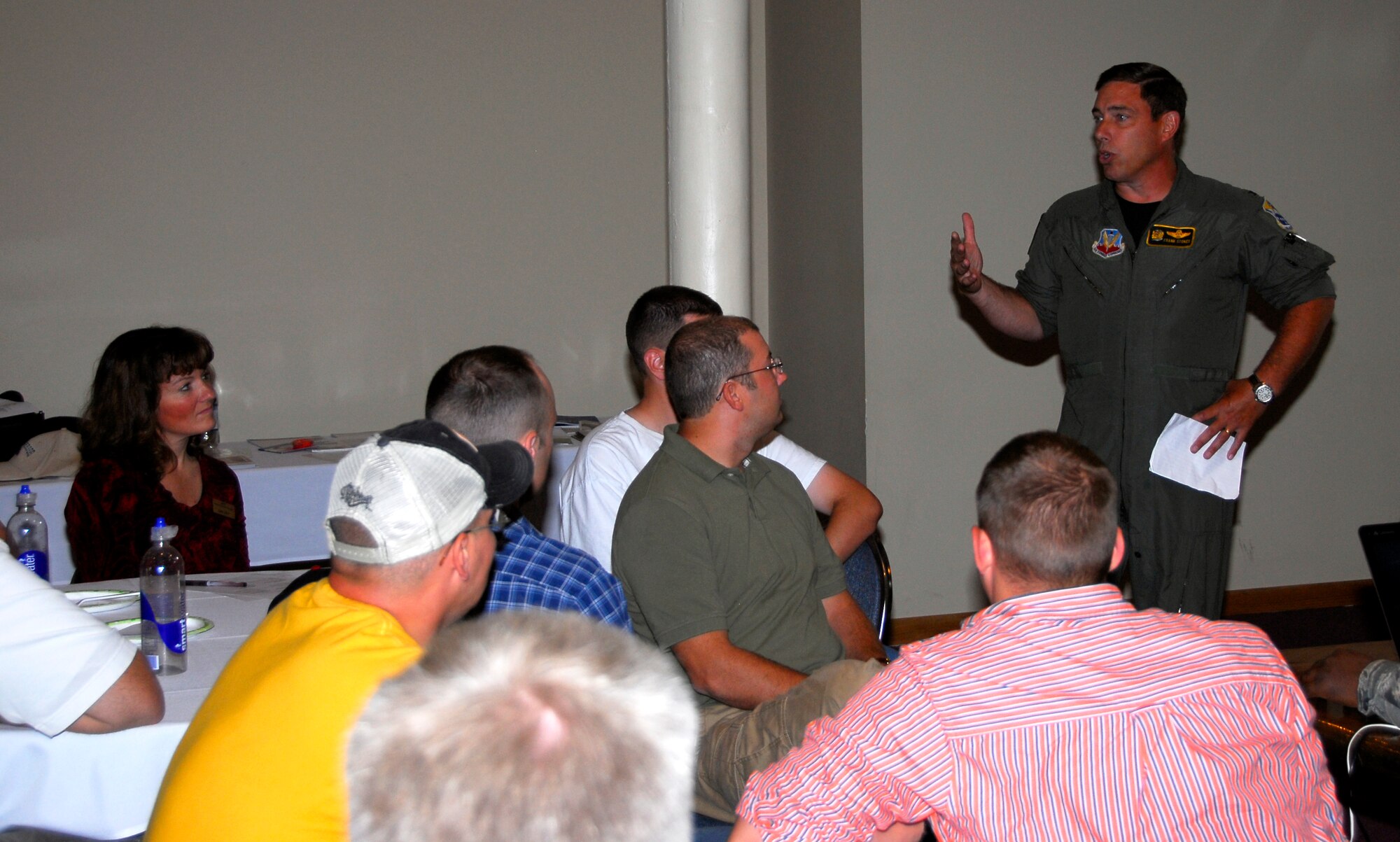 Col. Frank Stokes, Commander of the 148th Fighter Wing, speaks to members of the 148th Fighter Wing Security Forces Squadron during a 60-day Yellow Ribbon Reintegration Program event on Aug. 8, 2010 in Duluth, Minn.