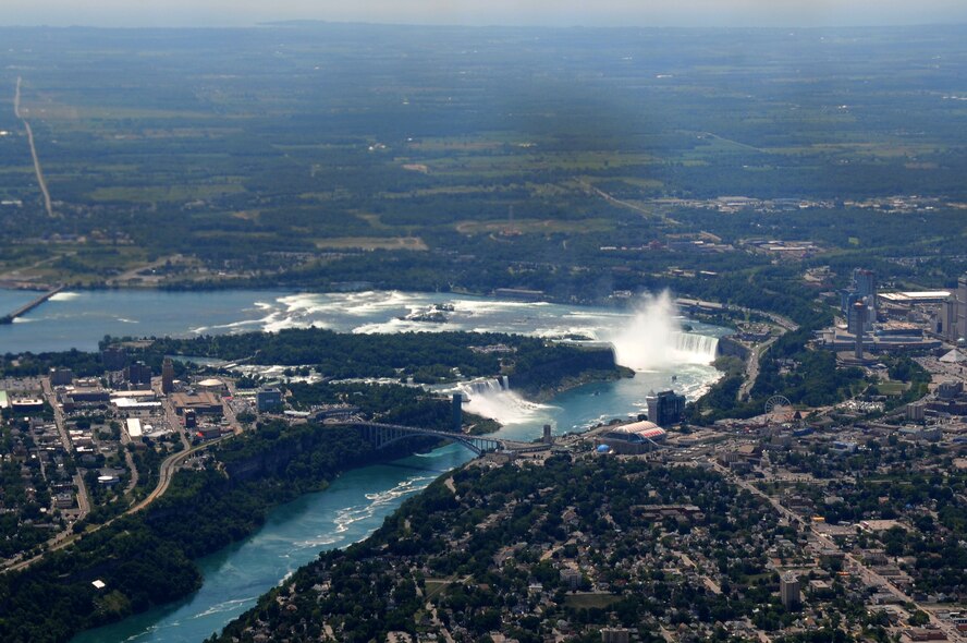 A C-130 flies over Niagara Falls during Bosses Day 6 August 2010. Bosses Day is held every year to educate employers on operations, deployments and tasks reservists perform. (U.S. Air Force Reserve Photo by Senior Airman Jessica Mae Snow)