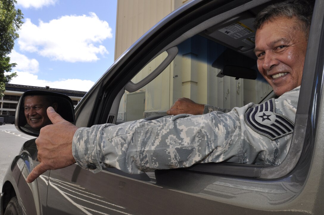 Tech. Sgt. Louis McCabe flashes a "Shaka" good-bye as he heads out, soon to take off his uniform for the last time. Sergeant McCabe, more popularly known by rank and file as "Uncle Louie," began his military career with a tour in Vietnam with the active-duty Navy. He retired from the 48th Aerial Port Squadron and the Air Force Reserve on Aug. 8, 2010. (U.S. Air Force Photo/Master Sgt. Daniel Nathaniel)