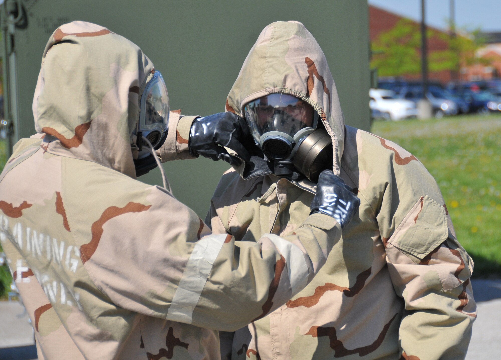 Airmen of the 932nd Airlift Wing, Air Force Reserve Command, perform inspections on each other's training gear.  This is part of Ability to Survive and Operate classes designed to keep deployment skills sharp.  (U.S. Air Force photo/Maj. Stan Paregien)