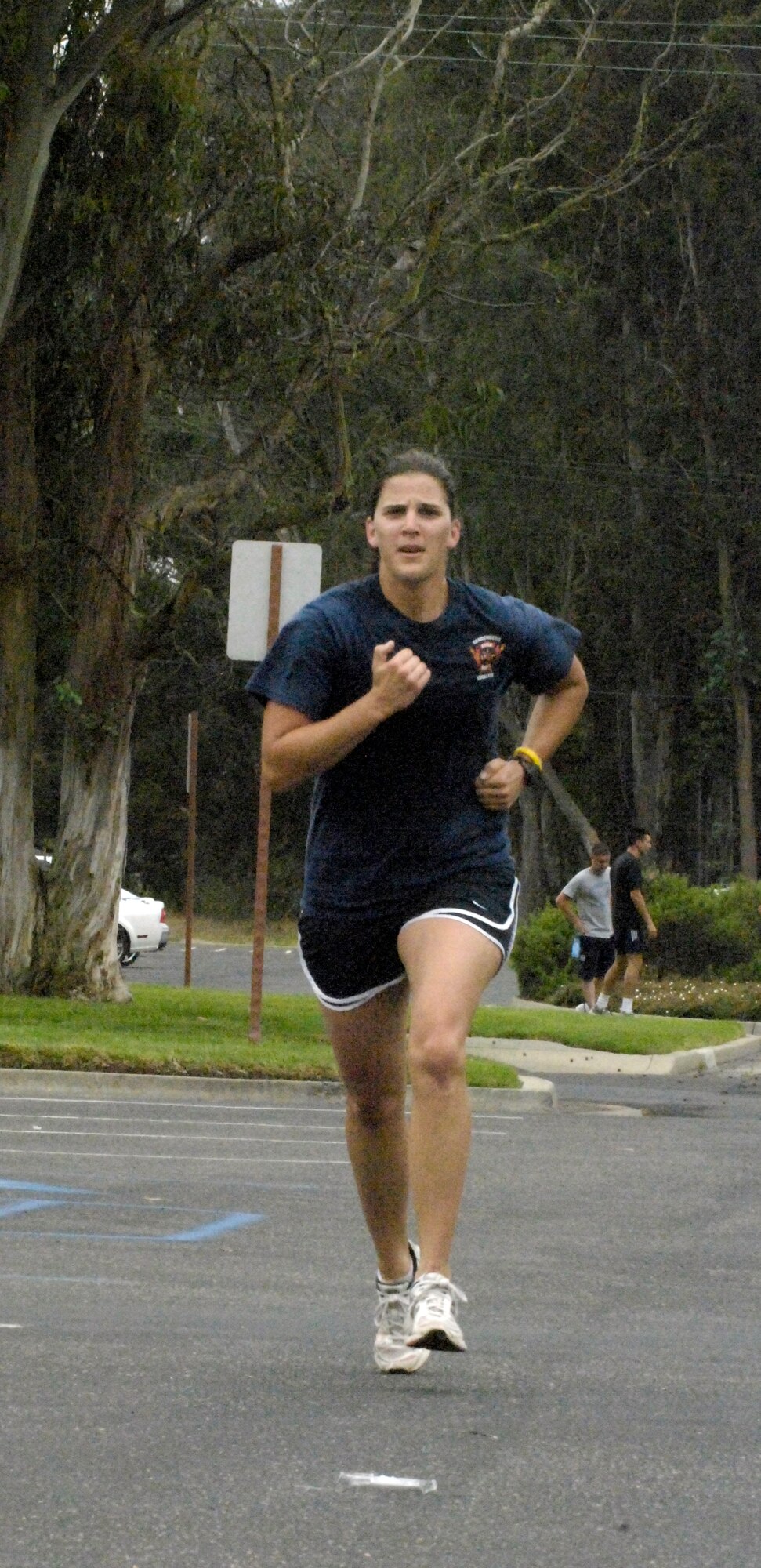 VANDENBERG AIR FORCE BASE, Calif. –Marissa Halbeisen, of the 30th Civil Engineer Squadron, sprints for the finish line during the base’s annual triathlon here Saturday, Aug. 7, 2010. Ms. Halbeisen won the heat for her age group with a time of 1 hour, 14 minutes, 14 seconds. (U.S. Air Force photo/Airman 1st Class Lael Huss)