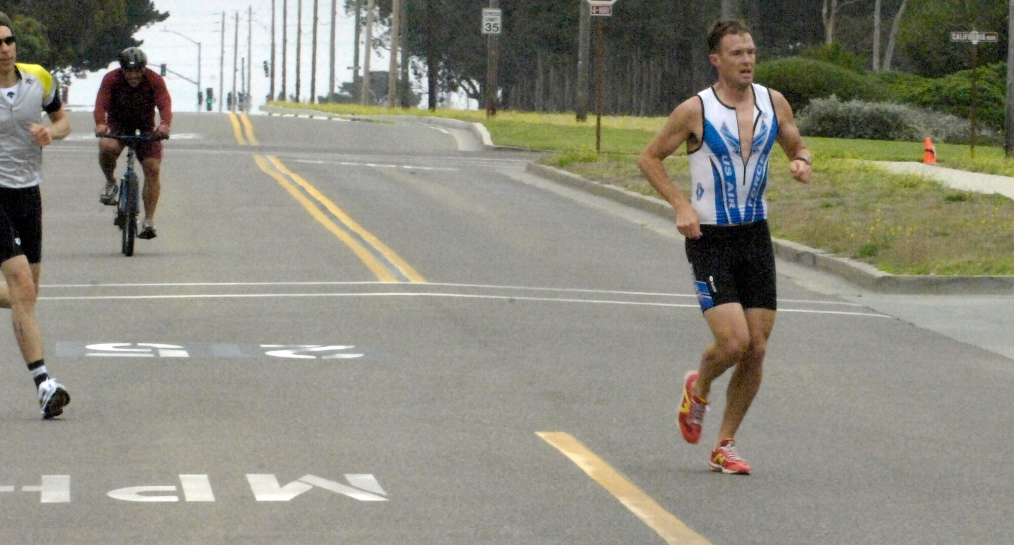 VANDENBERG AIR FORCE BASE, Calif. – Maj. Zach Owen, of the 14th Air Force, begins the last leg of the base’s annual triathlon here Saturday, Aug. 7, 2010. Mr. Owen took first place with a time of 1 hour and 46 seconds in the men’s 30-39 age group. (U.S. Air Force photo/Airman 1st Class Lael Huss)