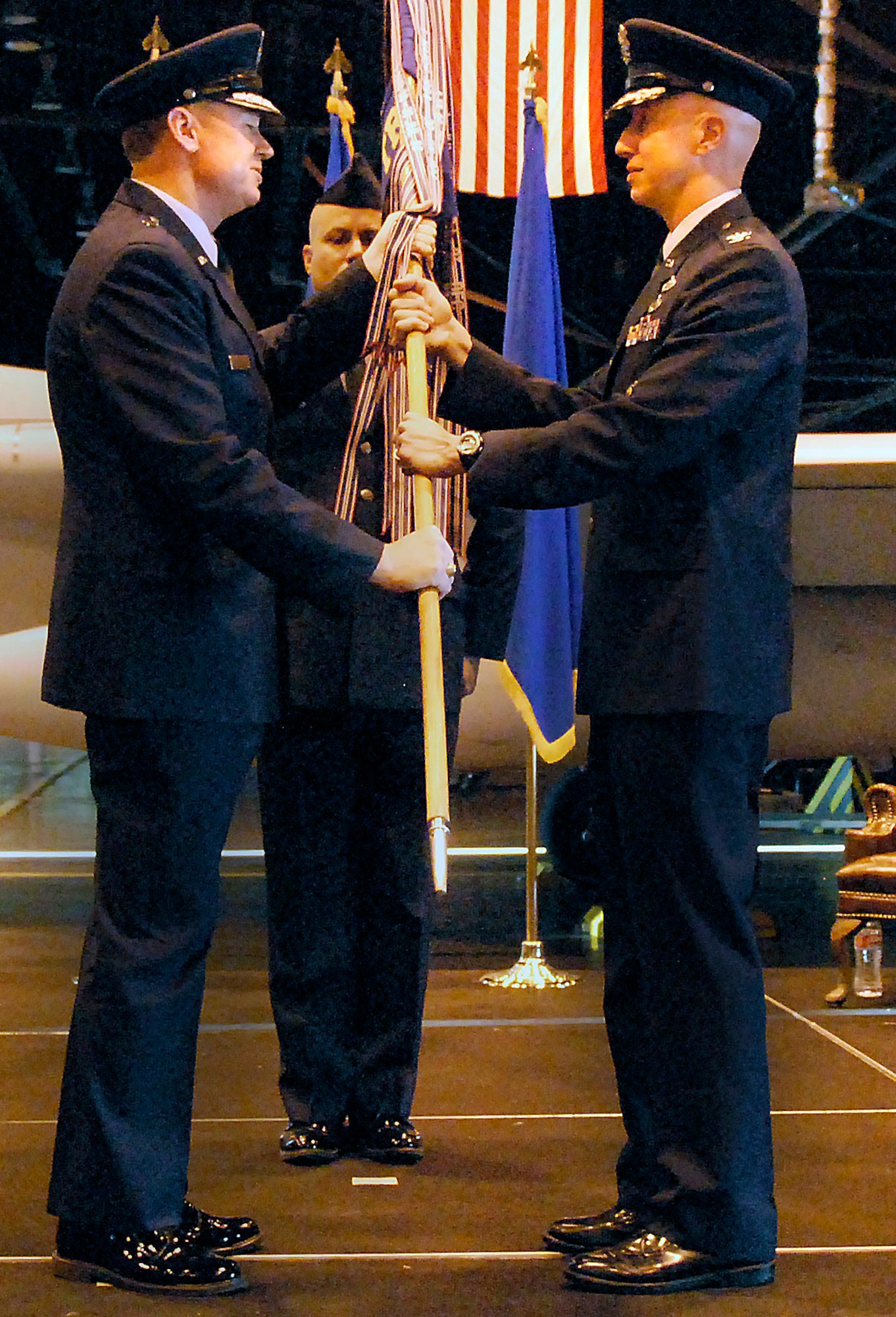 Col. Peter Markle (right) takes command of the 982nd Training Group from Brig. Gen. Darryl Burke (left), 82nd Training Wing commander, during the 982nd TRG change of command ceremony at Sheppard Air Force Base, Texas, Aug. 6 in Hangar 1360.  The 982nd TRG has more than 1,200 people assigned within two training squadrons and one maintenance squadron.  The group’s annual student production exceeded 30,000 graduates.  (U.S. Air Force photo/Mike Litteken)