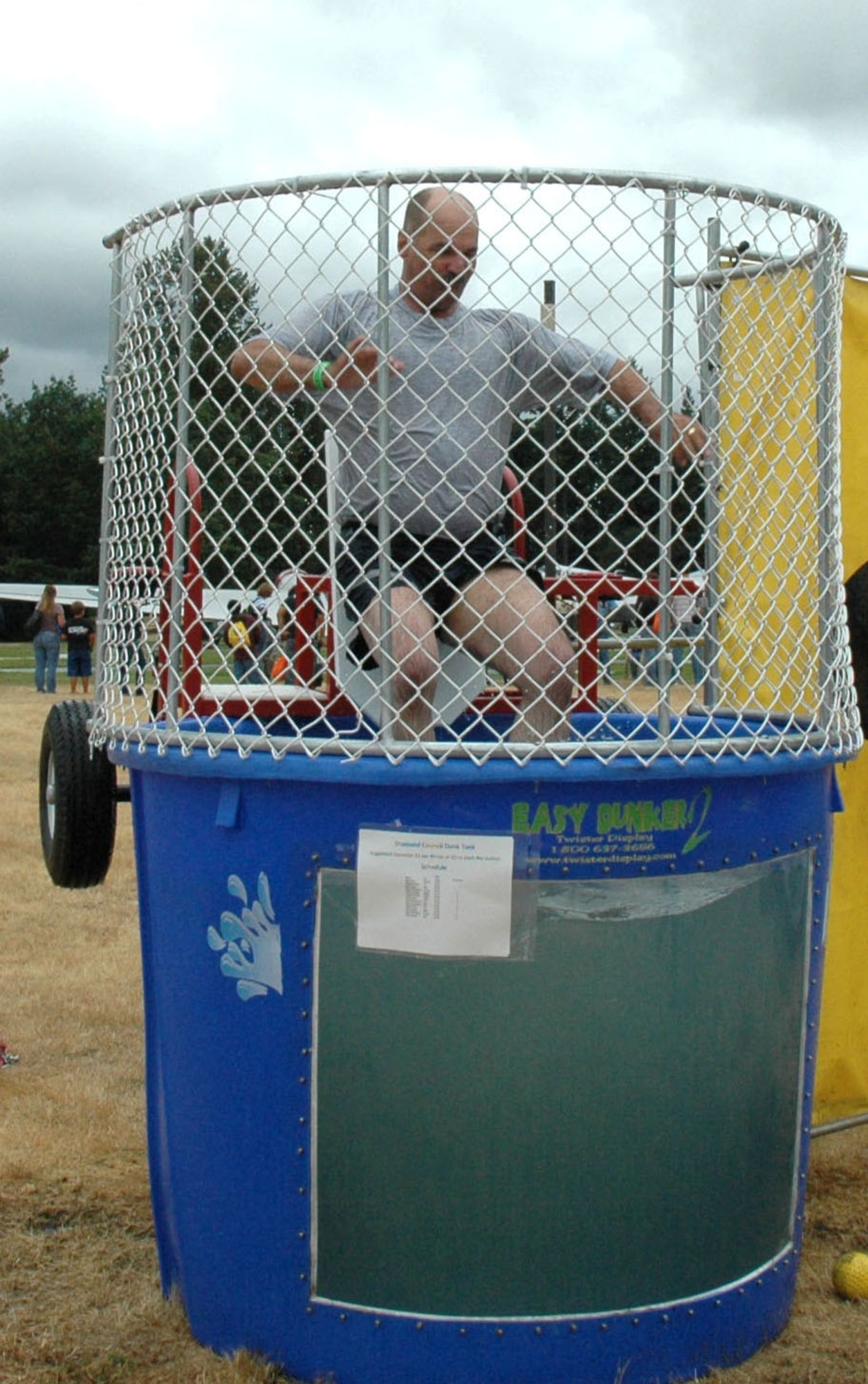 JOINT BASE LEWIS-MCCHORD, Wash., - Master Sgt. Robert Davenport, 97th Airlift Squadron first sergeant, volunteers for the Diamond Council Dunk Tank at the 446th Airlift Wing Family Day Aug. 7. (U.S. Air Force photo/Staff Sgt. Elizabeth Moody)
