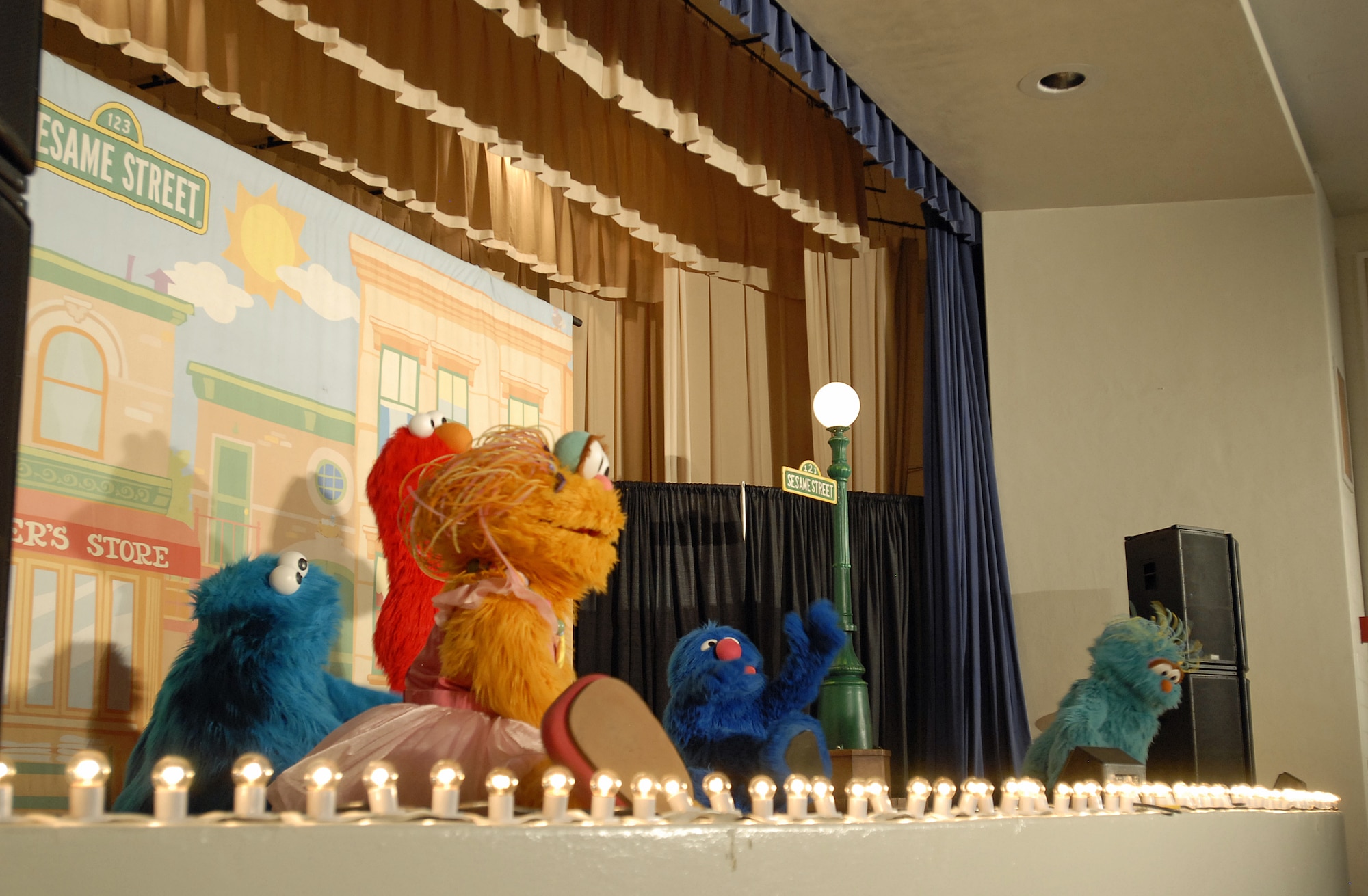 With the help of Elmo and his friends, the Sesame Street/USO Experience for Military Families addresses the concerns of today’s military families as they deal with the hardships of deployments and separation from loved ones. The performance took place at the Peterson Air Force Base auditorium July 31. (U.S. Air Force Photo/Airman 1st class Jessica Hines)