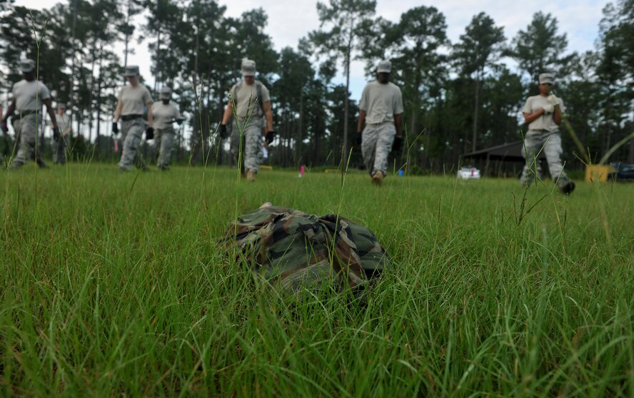 MOODY AIR FORCE BASE, Ga. -- Moody Airmen conduct search and recovery sweeps during a training session here Aug. 6. The Airmen are part of Moody’s search and recovery team whose mission is to search for and recover deceased individuals and their personal effects. (U.S. Air Force photo by Airman 1st Class Joshua Green/RELEASED)