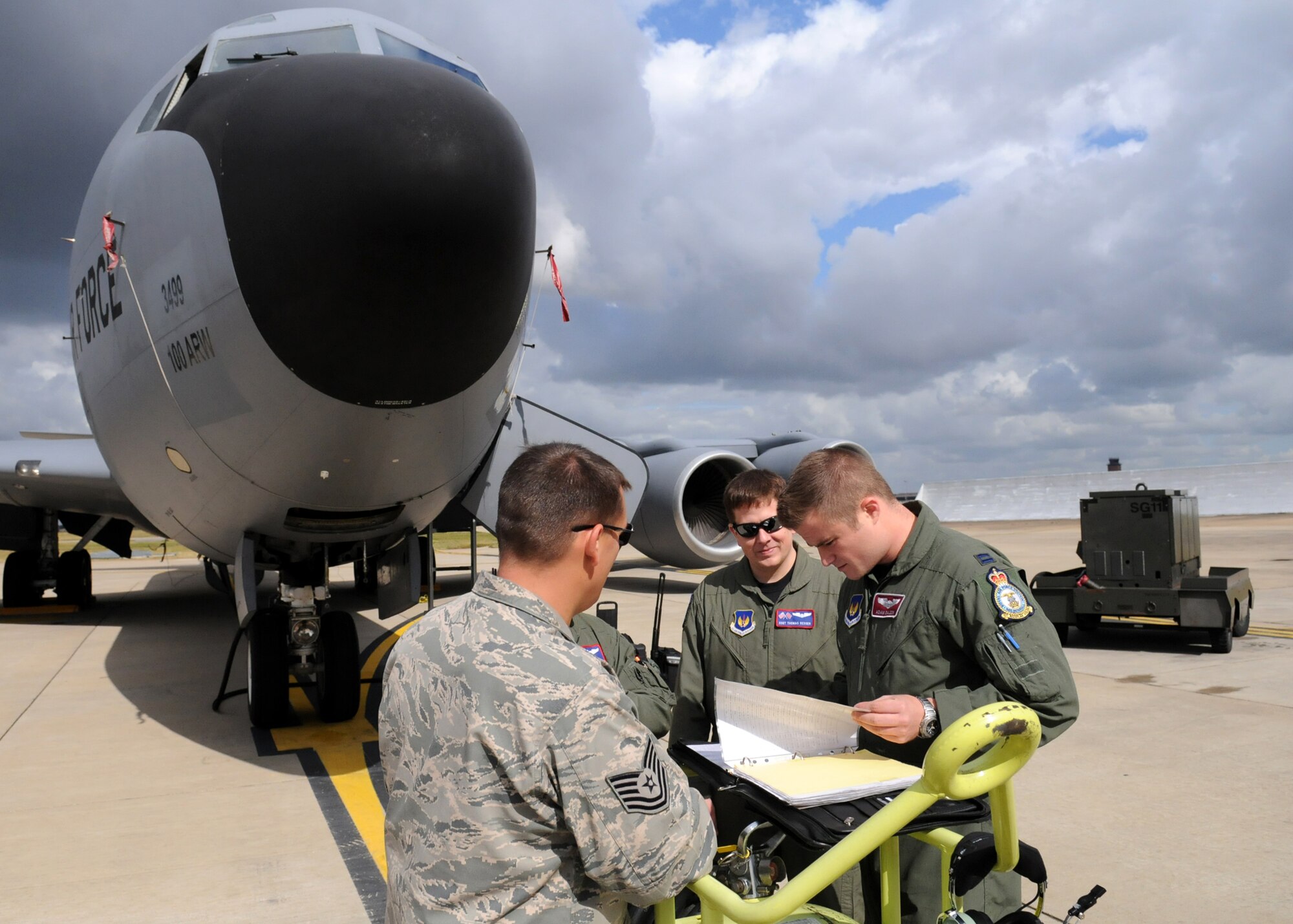 RAF MILDENHALL, England – A KC-135 aircrew checks aircraft forms prior to their walkaround during an annual Allied Strike exercise Aug. 5. Allied Strike is Europe’s premier annual close air support exercise that helps build partnership capacity among allied NATO nations and joint services. (U.S. Air Force photo/ Staff Sgt. Jerry Fleshman)
