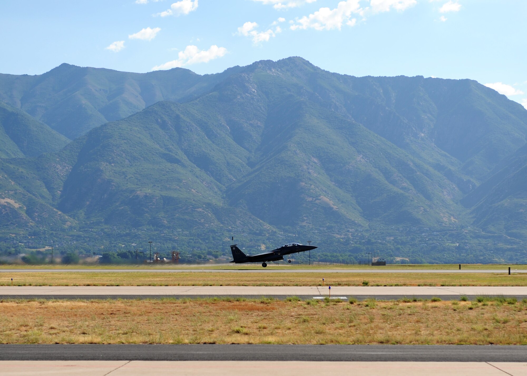 An F-15E Strike Eagle from the 391st Fighter Squadron lifts off for a Combat Hammer mission at Hill Air Force Base, Utah.  Combat Hammer is an air-to-ground Weapons System Evaluation Program maintained by the 86th Fighter Weapons Squadron.  Combat Hammer marked the first of three weeks of evaluation at Hill AFB by the 53rd Weapons Evaluation Group.  Combat Archer, an air-to-air evaluation, is the second week, followed by a combined air and ground WSEP in the final week.  The WSEP program is used to evaluate the effectiveness and suitability of combat air force weapon systems. The evaluations are accomplished during tactical deliveries of fighter, bomber and unmanned aerial system precision guided munitions, on realistic targets with air-to-air and surface-to-air defenses. For many of the aircrew participating in WSEP, it is the first time employing live weapons. This provides a level of combat experience many units face during combat. (Courtesy photo.)
