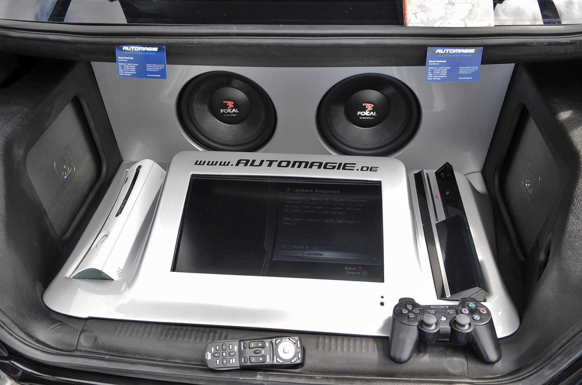 SPANGDHAHLEM AIR BASE, Germany – A customized car trunk is outfitted with a TV screen, Xbox 360 and Playstation 3 on display Aug. 8. at Spangdahlem’s Motor Weekend 2010. 52nd Force Support Squadron members sponsored the event with 17 award categories in which military members and civilians competed with various sports and classic vehicles to include, motorcycles, trucks and sport utility vehicles. (U.S. Air Force photo/Senior Airman Nick Wilson)