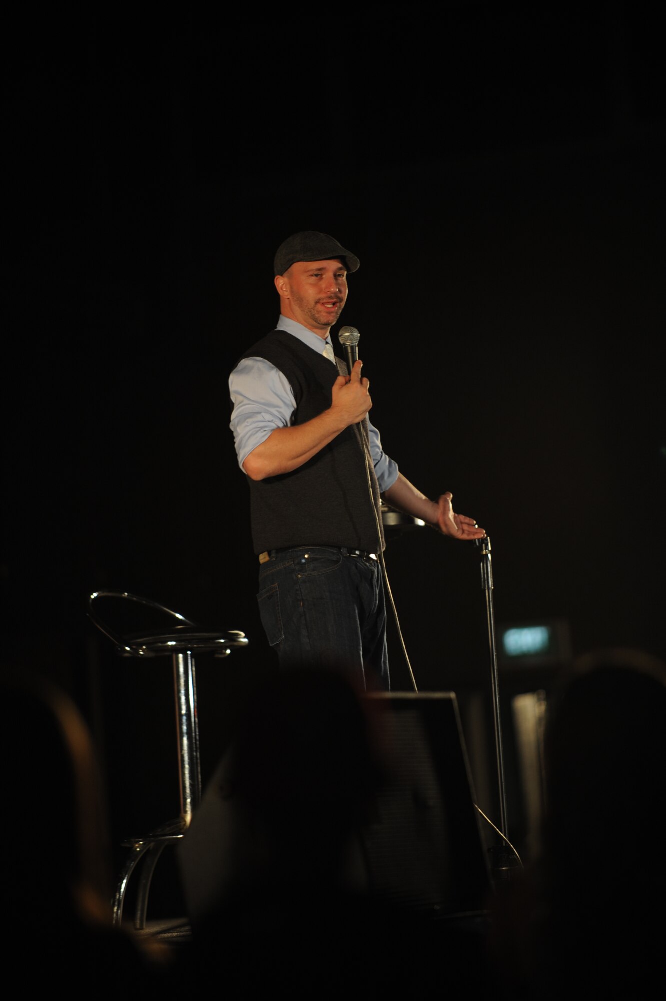 SPANGDAHLEM AIR BASE, Germany – Comedian Bryan Ricci performs at the Skelton Memorial Fitness Center Aug. 6. Ricci and comedian D.L. Hughley provided a free show for members of the 52nd Fighter Wing, with approximately 625 Sabers in attendance. (U.S. Air Force photo/Senior Airman Nick Wilson)