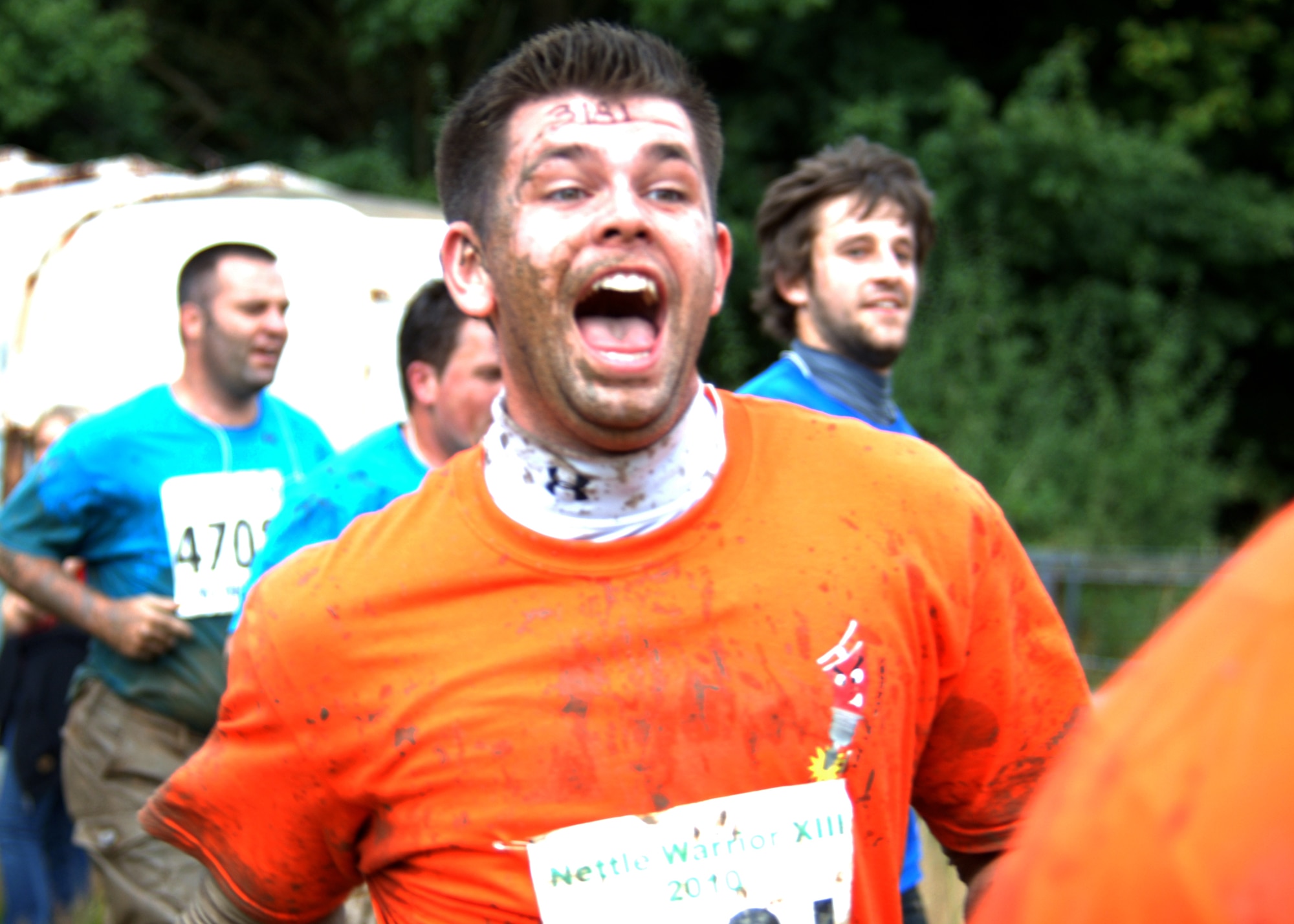 Marine Sgt. Jordan W, Jacobs grimaces as he faces yet another obtacle in the "killing fields" during the July 25th UK TOUGH GUY/NETTLE WARRIOR competition in Perton, England.  Jacobs was part of the 35 person team from RAF Molesworth competing in the event.  U. S. Air Force photo by Staf Sgt Javier Cruz