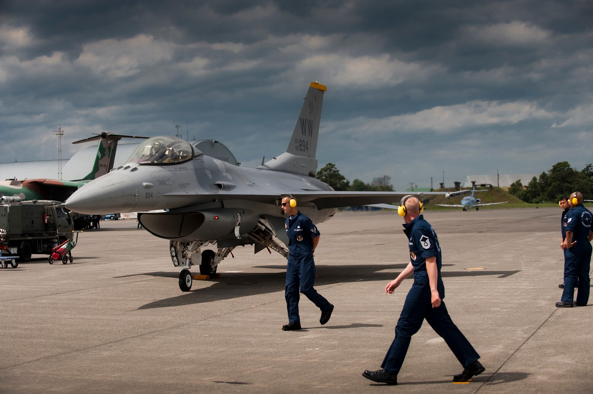 CHITOSE AIR BASE, Japan -- Capt. Jeff Schneider, Pacific Air Forces Demonstration Team pilot, parks an F-16 Fighting Falcon at Chitose Air Base Aug. 6. Captain Schneider  was scheduled to perform the following Sunday during the Chitose Air Festival. (U.S. Air Force photo/Staff Sgt. Samuel Morse)
