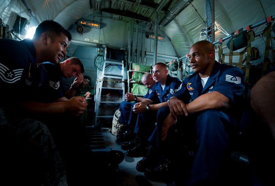 CHITOSE AIR BASE, Japan -- Members of the Pacific Air Forces Demonstration Team ride a Japan Air Self-Defense Force C-1 aircraft to Chitose Air Base, Aug. 6. The team traveled from Misawa Air Base to perform at the Chitose Air Festival. (U.S. Air Force photo/Staff Sgt. Samuel Morse)