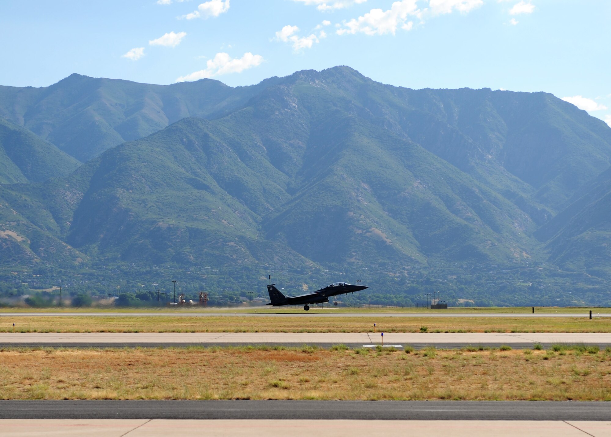 An F-15E Strike Eagle from the 391st Fighter Squadron lifts off for a Combat Hammer mission at Hill Air Force Base, Utah.Twelve planes, eighteen pilots, and thirty- crews from the 391st FS travelled down to Hill AFB to participate in the three week weapons system evaluation. Combat Hammer is an air-to-ground Weapons System Evaluation Program maintained by the 86th Fighter Weapons Squadron. Combat Hammer marked the first of three weeks of evaluation at Hill AFB by the 53rd Weapons Evaluation Group. Combat Archer, an air-to-air evaluation, is the second week, followed by a combined air and ground WSEP in the final week. The WSEP program is used to evaluate the effectiveness and suitability of combat air force weapon systems. The evaluations are accomplished during tactical deliveries of fighter, bomber and unmanned aerial system precision guided munitions, on realistic targets with air-to-air and surface-to-air defenses. For many of the aircrew participating in WSEP, it is the first time employing live weapons. This provides a level of combat experience many units face during combat. (Courtesy photo.) 
