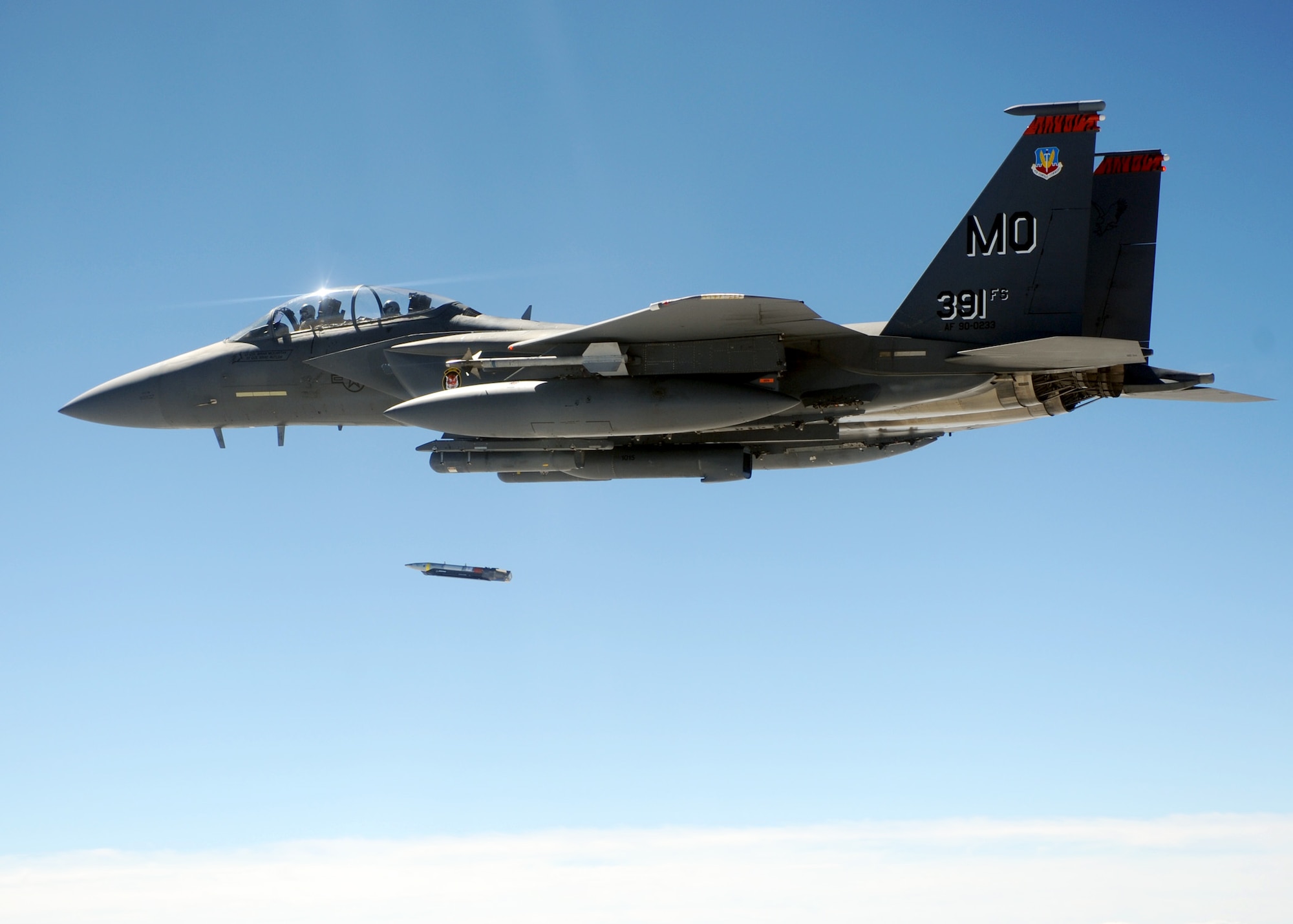 An F-15E Strike Eagle from the 391st Fighter Squadron drops a small diameter bomb during a Combat Hammer mission at Hill Air Force Base, Utah.Twelve planes, eighteen pilots, and thirty- crews from the 391st FS travelled down to Hill AFB to participate in the three week weapons system evaluation. Combat Hammer is an air-to-ground Weapons System Evaluation Program maintained by the 86th Fighter Weapons Squadron. Combat Hammer marked the first of three weeks of evaluation at Hill AFB by the 53rd Weapons Evaluation Group. Combat Archer, an air-to-air evaluation, is the second week, followed by a combined air and ground WSEP in the final week. The WSEP program is used to evaluate the effectiveness and suitability of combat air force weapon systems. The evaluations are accomplished during tactical deliveries of fighter, bomber and unmanned aerial system precision guided munitions, on realistic targets with air-to-air and surface-to-air defenses. For many of the aircrew participating in WSEP, it is the first time employing live weapons. This provides a level of combat experience many units face during combat. (Courtesy photo.) 

