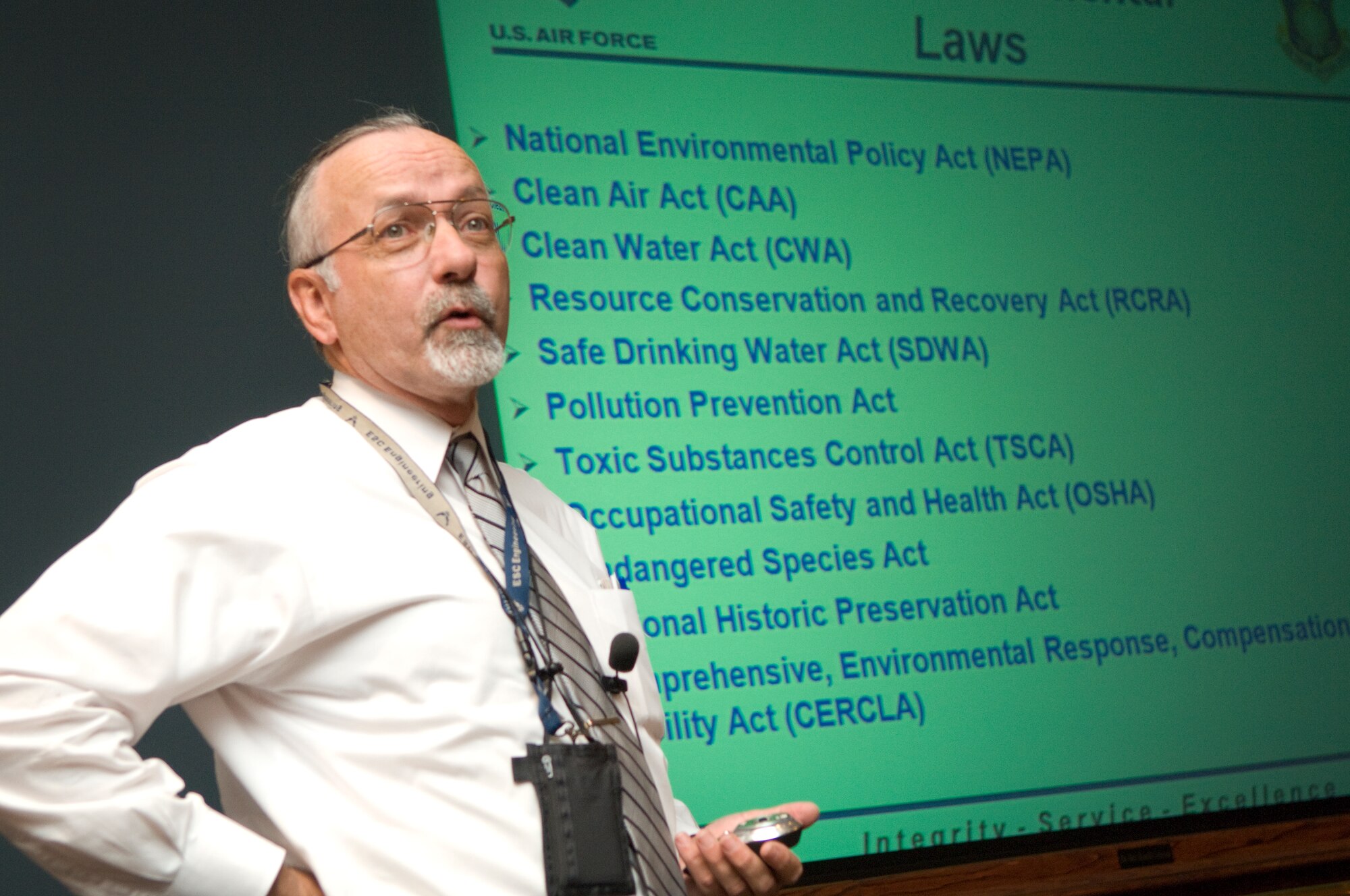 During an educational session in the Lexington Amphitheater Aug. 10, Peter Logan of Electronic Systems Center’s Engineering Directorate discusses a list of environmental laws that programs must comply with.  The course,
Environmental Engineering and Science for Acquisition, was one of many offerings during ESC’s Acquisition Workforce Development Weeks, which kicked off Aug. 2 and wrap up Aug. 13  (U.S. Air Force Photo by Mark Wyatt.)
