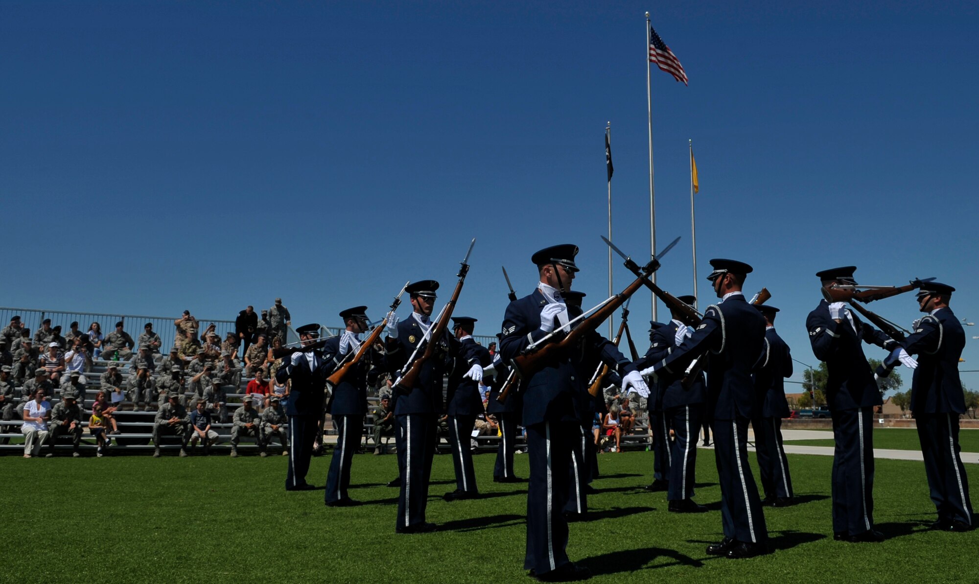 HOLLOMAN AIR FORCE BASE, N.M. -- Sixteen members of the United States Air Force Honor Guard Drill Team perform for Team Holloman Aug. 6, 2010. The drill team inspires Air Force awareness among military and civilian audiences by personifying the precision, discipline, teamwork and professionalism of every Air Force mission.  (U.S. Air Force photo by Airman 1st Class Joshua Turner / Released)