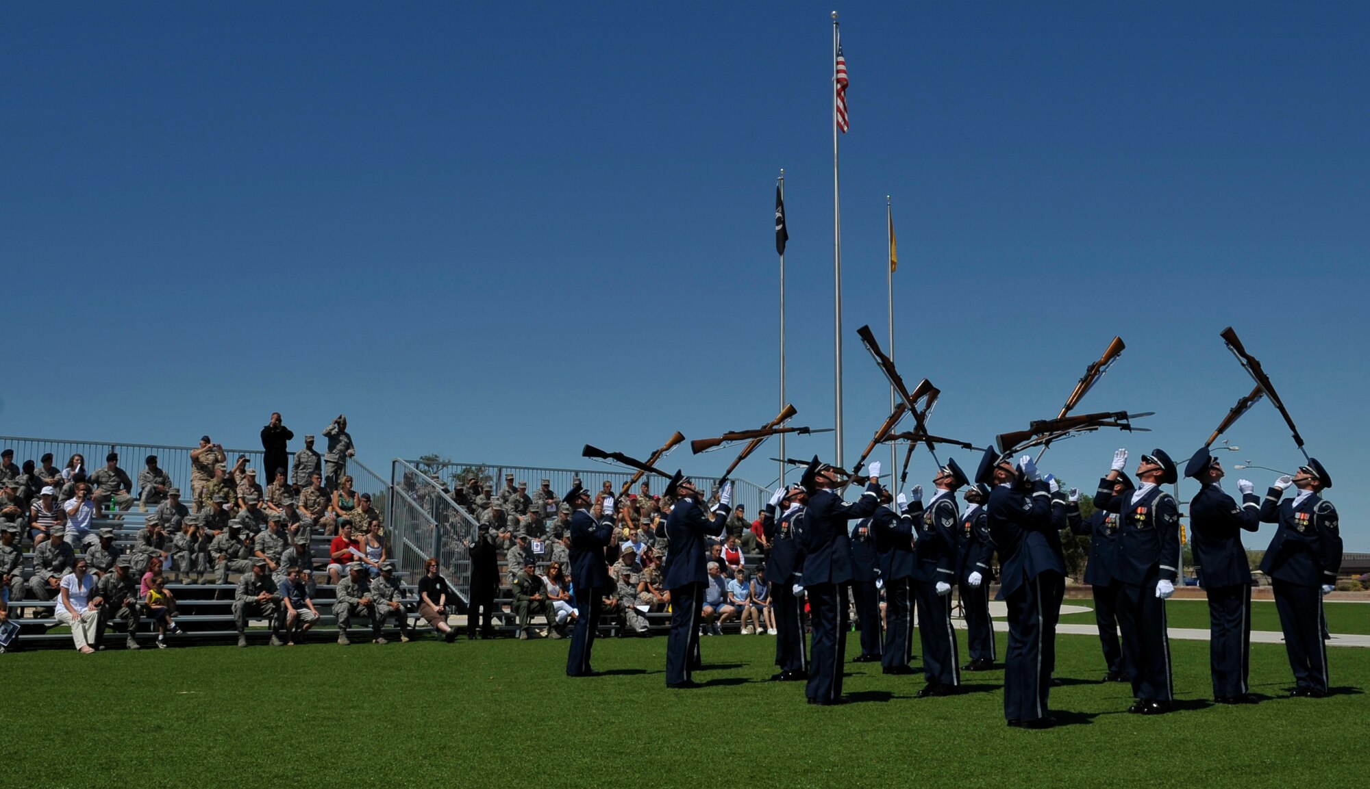 HOLLOMAN AIR FORCE BASE, N.M. -- Sixteen members of the United States Air Force Honor Guard Drill Team perform for Team Holloman Aug. 6, 2010. The drill team inspires Air Force awareness among military and civilian audiences by personifying the precision, discipline, teamwork and professionalism of every Air Force mission.  (U.S. Air Force photo by Airman 1st Class Joshua Turner / Released)