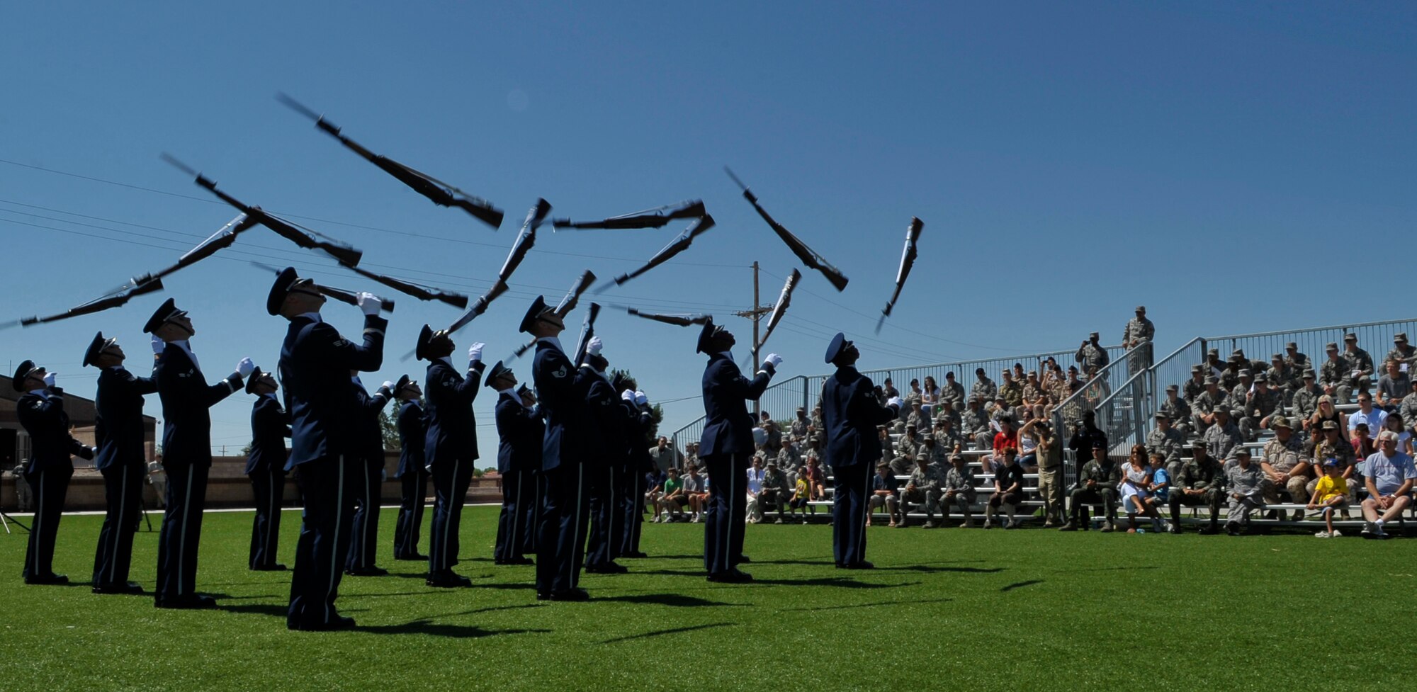 HOLLOMAN AIR FORCE BASE, N.M. -- Sixteen members of the United States Air Force Honor Guard Drill Team perform for Team Holloman Aug. 6, 2010. The drill team inspires Air Force awareness among military and civilian audiences by personifying the precision, discipline, teamwork and professionalism of every Air Force mission.  (U.S. Air Force photo by Airman 1st Class Joshua Turner / Released)