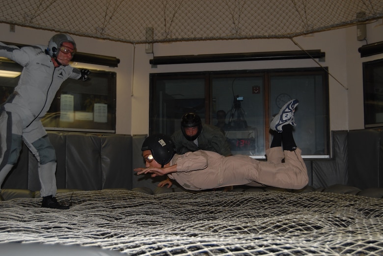 Civil Air Patrol cadets fly in the Fort Bragg wind tunnel Aug. 5 during a combat control orientation course at Pope.  The CCOC is a week-long course during which Civil Air Patrol cadets replicate the training environment and promote an awareness of the job duties performed within combat control and special tactics. (U.S. Air Force Photo/ 1st Lt. Cammie Quinn)