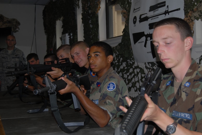 Civil Air Patrol cadets participate in weapons training Aug. 4 during a combat control orientation course at Pope.  The CCOC is a week-long course during which Civil Air Patrol cadets replicate the training environment and promote an awareness of the job duties performed within combat control and special tactics. (U.S. Air Force Photo/ 1st Lt. Cammie Quinn)
