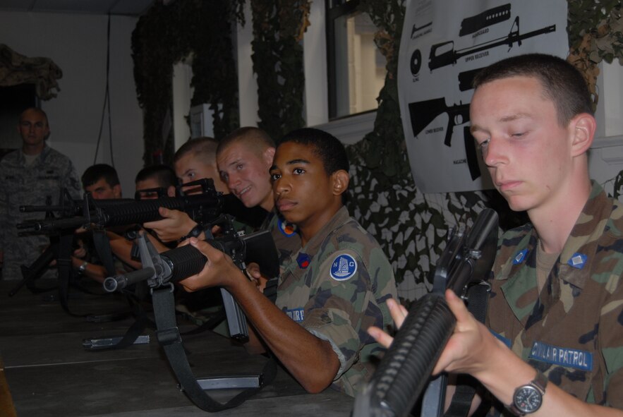 Civil Air Patrol cadets participate in weapons training Aug. 4 during a combat control orientation course at Pope.  The CCOC is a week-long course during which Civil Air Patrol cadets replicate the training environment and promote an awareness of the job duties performed within combat control and special tactics. (U.S. Air Force Photo/ 1st Lt. Cammie Quinn)
