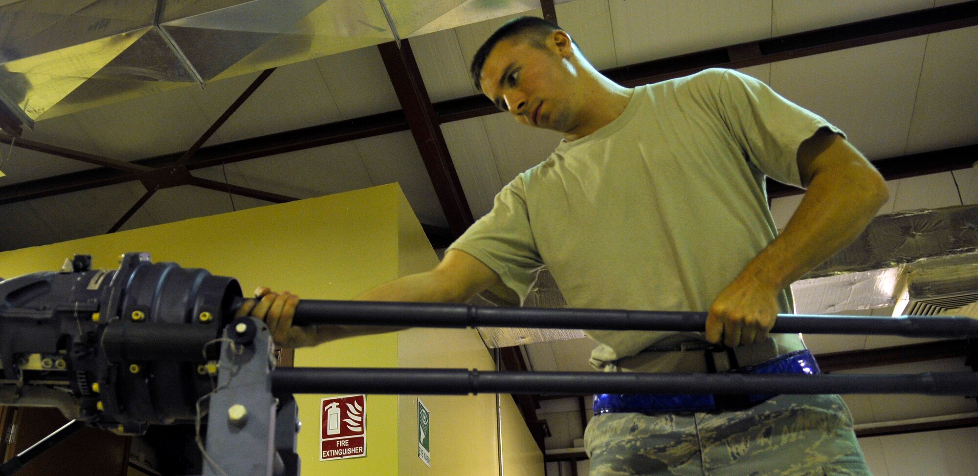 Senior Airman Matthew Wilson, 332nd Expeditionary Maintenance Squadron, Armament Flight specialist, inserts a M61A1 Gatling-type gun barrel in the main gun housing’s breech during a weapon’s build Aug. 6, 2010, Joint Base Balad, Iraq. The M61A1 is more than 70 inches in length and weights approximately 200 pounds. Airman Wilson, a native of Lexington, S.C., is deployed from Shaw Air Force Base, S.C. (U.S. Air Force photo/Staff Sgt. Phillip Butterfield)