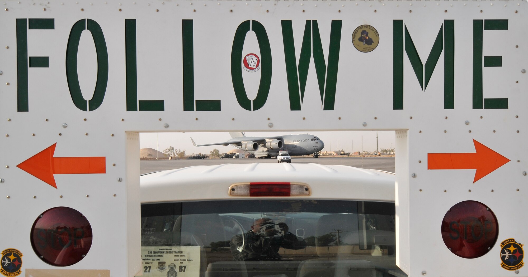 The Airmen of the 332nd Expeditionary Maintenance Squadron’s Transient Alert Shop use specialized vehicles to escort large aircraft on the flightline July 3, 2010, Joint Base Balad, Iraq. TA assists approximately 500 military and civilian aircraft a month that carry approximately 20,000 passengers, 4,000 tons of cargo and four tons of mail. (U.S. Air Force photo/ Staff Sgt. Phillip Butterfield)