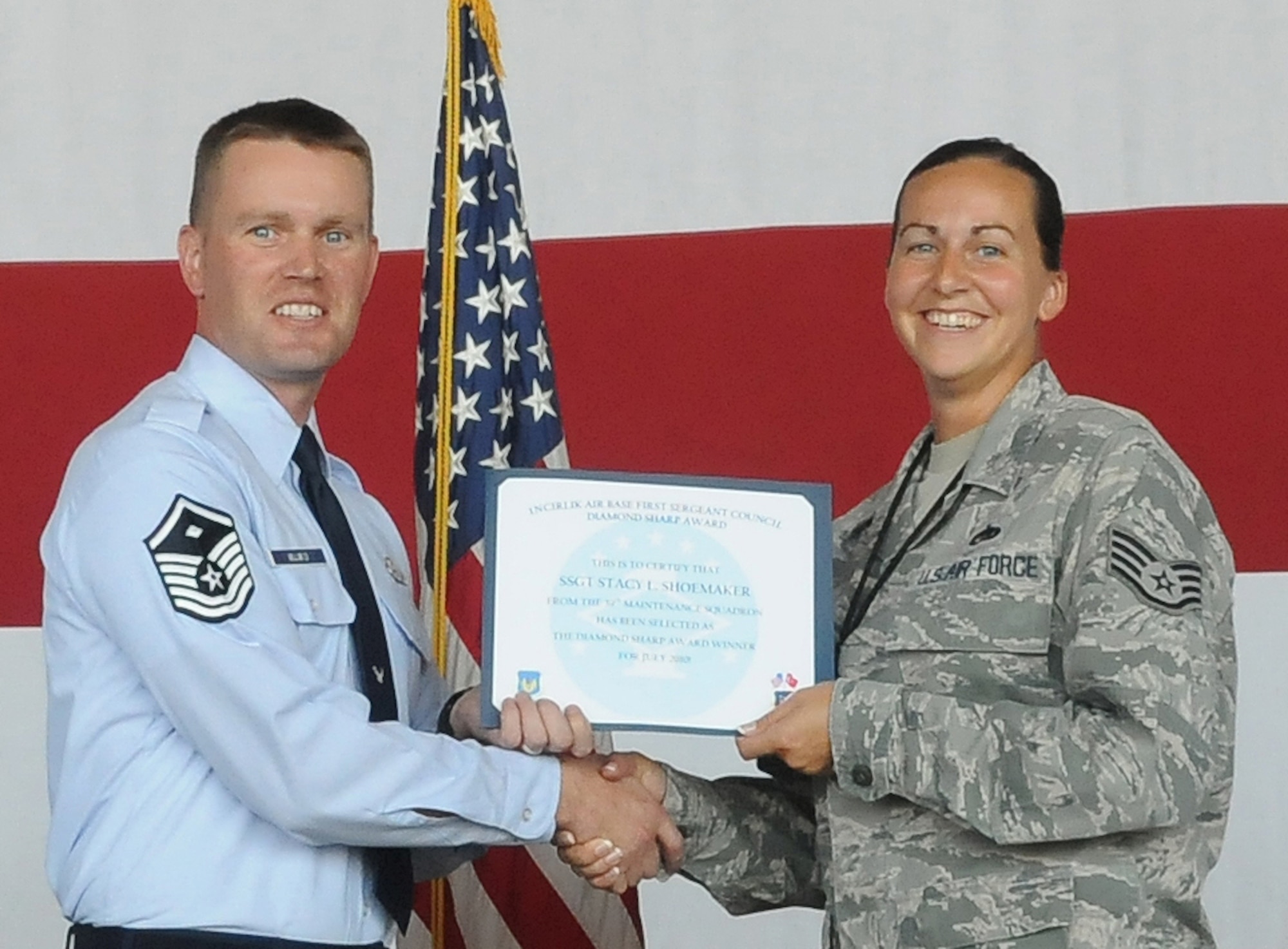 Staff Sgt. Stacy Shoemaker, 39th Maintenance Squadron, is presented the ‘Diamond Sharp’ award from the Incirlik First Sergeants Council August 9, 2010 at Incirlik Air Base, Turkey. Sergeant Shoemaker was nominated for the award by Master Sgt. Michael Mujwid, 39th MXS first sergeant, for distinguishing herself through outstanding professionalism, performance and display of the Air Force core values. (U.S. Air Force photo/ Senior Airman Alexandre Montes)

