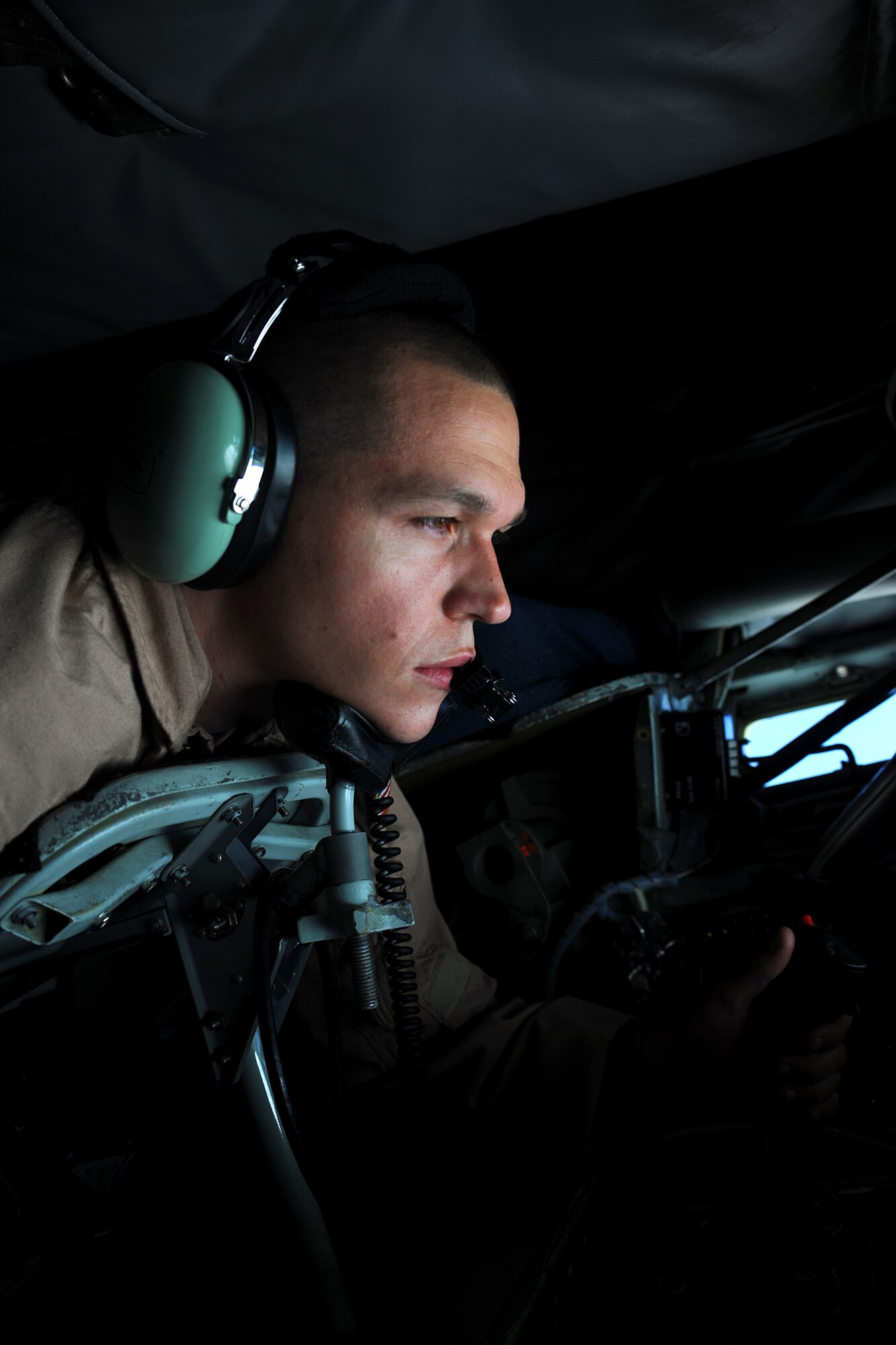 TRANSIT CENTER AT MANAS, Kyrgyzstan - Airman 1st Class, Nicolas Inzana, KC-135 Stratotanker boom operator deployed from 93d Air Refueling Squadron at Fairchild Air Force Base, Wash., refuels a Belgium Air Force F-16 Fighting Falcon Aug. 8.  The KC-135 flew over Afghanistan for five and a half hours delivering 7,200 gallons of TS-1 fuel.  (U.S. Air Force photo/Staff Sgt. Nathan Bevier)