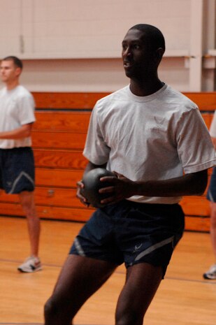 U.S. Air Force Airman 1st Class Jamel McCargo keeps a tight grip on the ball during the Commander?s Fitness Challenge dodgeball game Aug. 6, 2010, at the Fitness and Sports Center on Joint Base Charleston, S.C. In all, approximately 140 base members participated as part of the approximately 200 total attendees. Airman McCargo is a radio frequency transmission technician with the 628th Communications Squadron. (U.S. Air Force photo/Senior Airman Nicole Mickle)