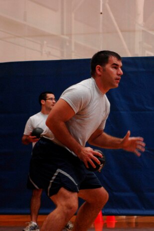 U.S. Air Force Tech Sgt. Jimmy Blevins looks for an opportunity to strike during the Commander?s Fitness Challenge dodgeball game Aug. 6, 2010, at the Fitness and Sports Center on Joint Base Charleston, S.C. From start to finish, the tournament lasted approximately two hours. Sergeant Blevins is an intelligence analyst with the 437th Operations Group. (U.S. Air Force photo/Senior Airman Nicole Mickle)