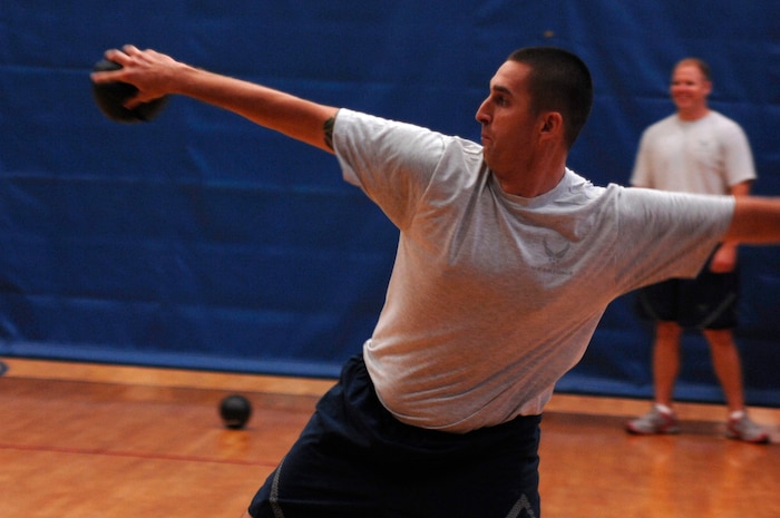U.S. Air Force Tech Sgt. Christopher Robinson keeps his eyes on his target during the Commander?s Fitness Challenge dodgeball game Aug. 6, 2010, at the Fitness and Sports Center on Joint Base Charleston, S.C.  The challenge is held the first Friday of every month to promote fitness around the base. Sergeant Robinson is a bioenvironmental engineer with the 628th Medical Group. (U.S. Air Force photo/Senior Airman Nicole Mickle)